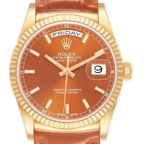 The image shows a frontal view of the Rolex President 118138 Men's Yellow Gold Orange Dial model, featuring its dial, bezel, crown, and part of the strap.