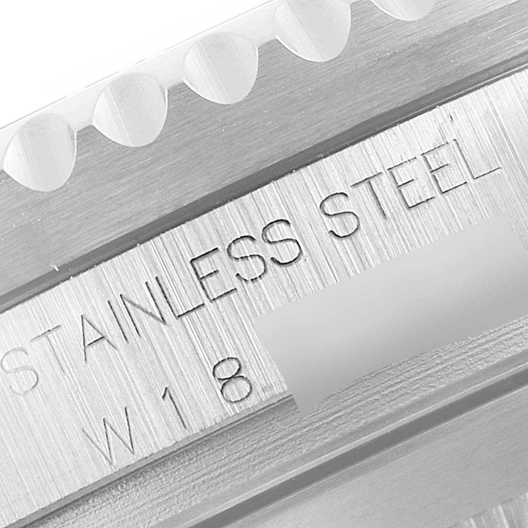 The image shows a close-up angle of the side part of a Rolex Sea-Dweller 16600 Men
s Stainless Steel Black Dial 16600 Men
s Stainless Steel Black Dial watch, with "stainless steel" and other details engraved.