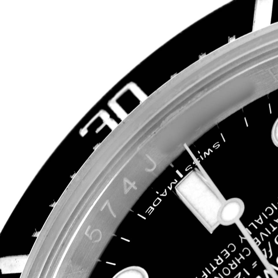 The image shows a close-up of the bezel and part of the dial of the Rolex Sea-Dweller 116600 Men's Stainless Steel Black Dial, displaying the number "30" and some dial text.