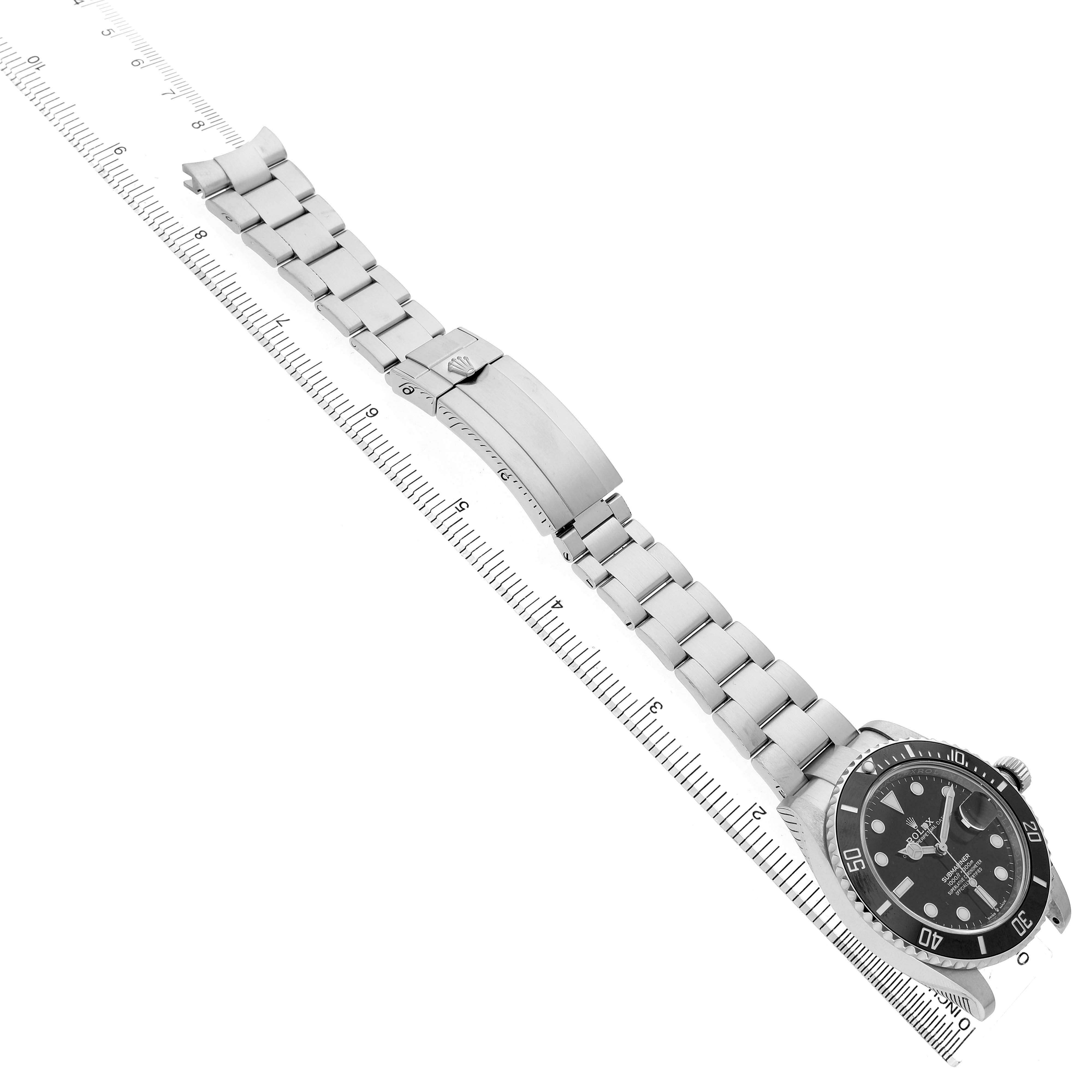 The Rolex Submariner 126610LN Men's Stainless Steel Black Dial watch is shown diagonally with a partial side view, highlighting the face, bezel, bracelet, and clasp.