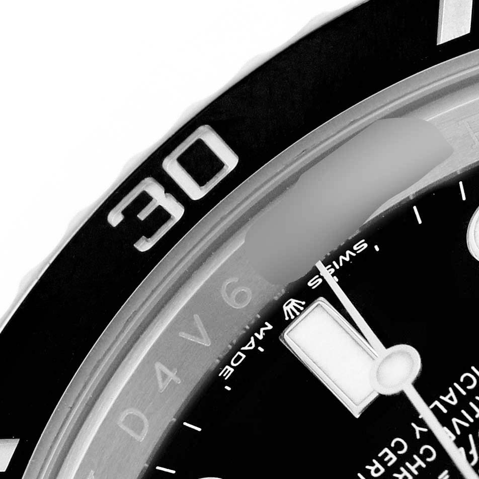 The image shows a close-up of the bezel and dial of a Rolex Submariner 126610LN Men's Stainless Steel Black Dial, focusing on the 30-minute marker and part of the watch face.