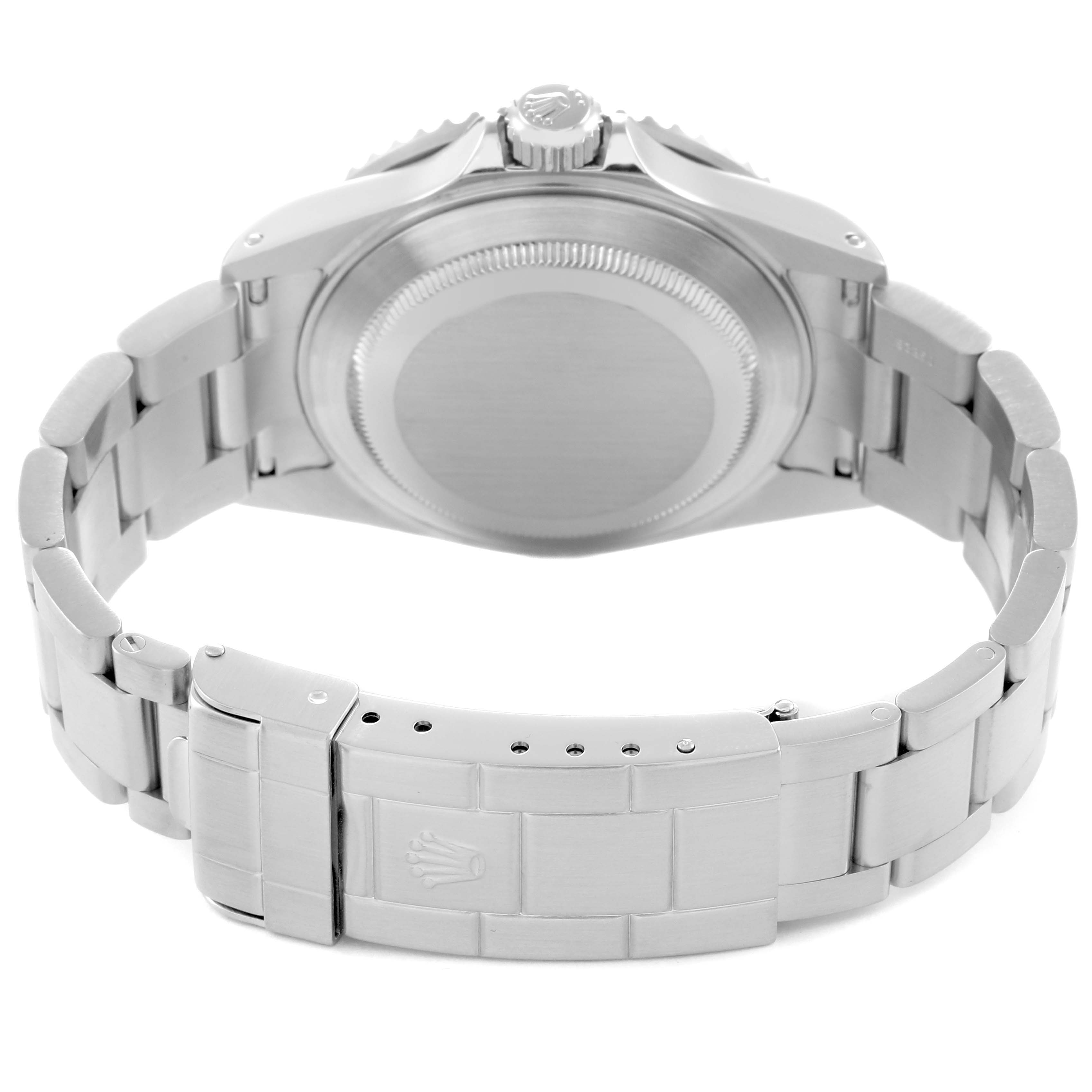 The image shows the back of a Rolex Submariner model 16610 men's watch, highlighting the case back, bracelet, and clasp.