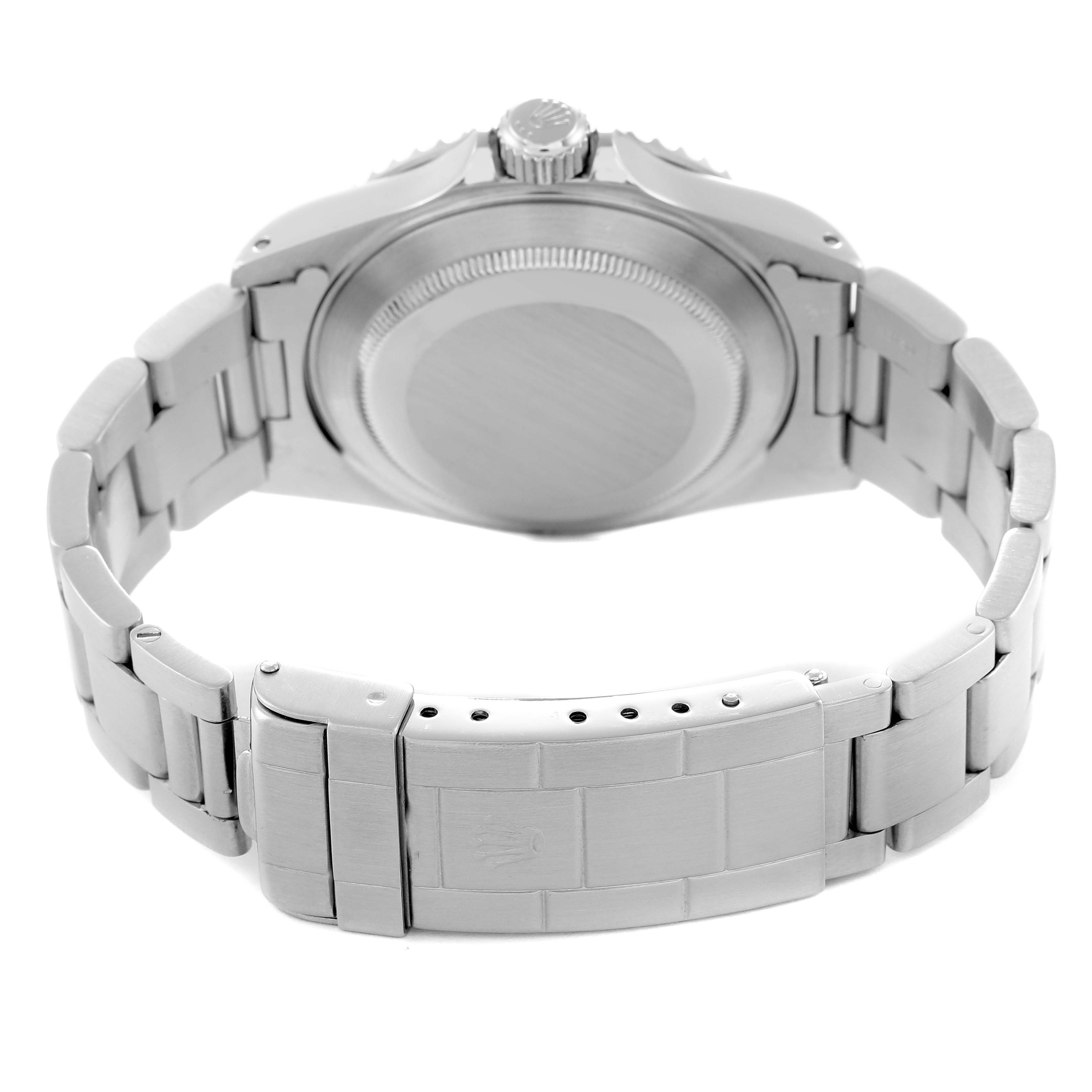 The image shows the back view of a Rolex Submariner model 14060 men's watch, focusing on the clasp, bracelet, and case back.