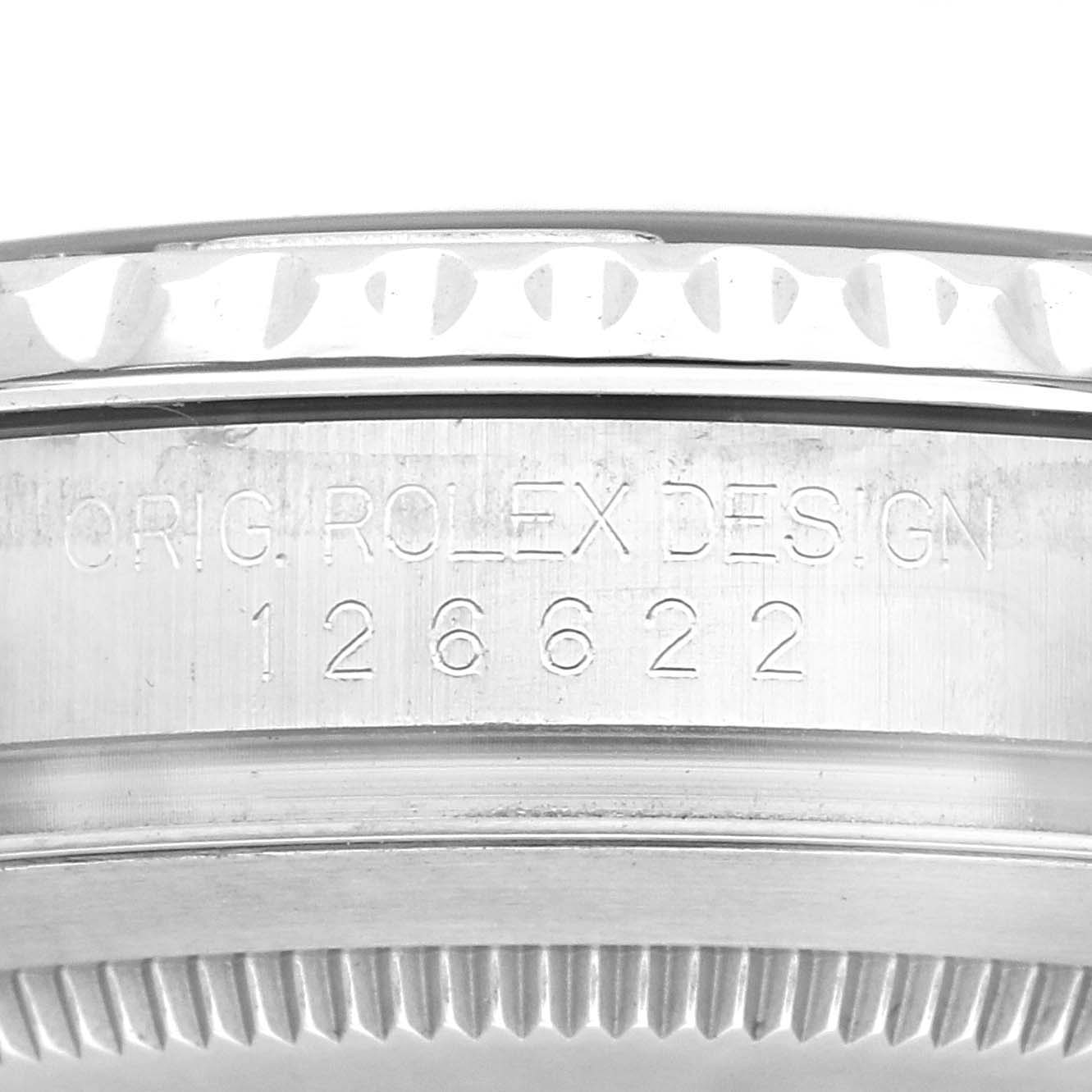 The image showcases a close-up of the side of a Rolex Yacht-Master, model number 126622, focusing on the engraved design inscription.