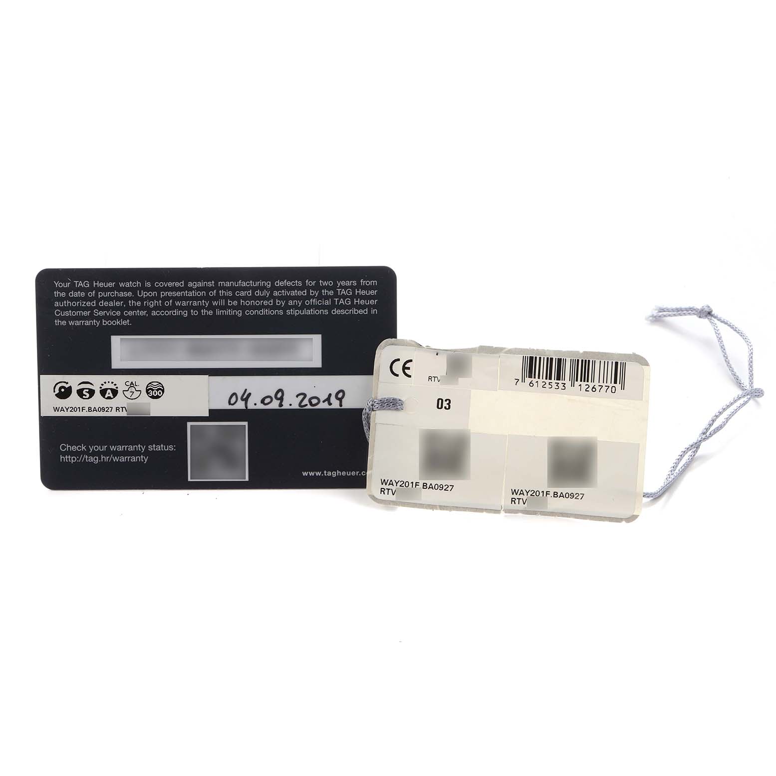 The image shows the warranty card and tag for the Tag Heuer Aquaracer model WAY201F men's watch, displaying model number, purchase date, and barcode.