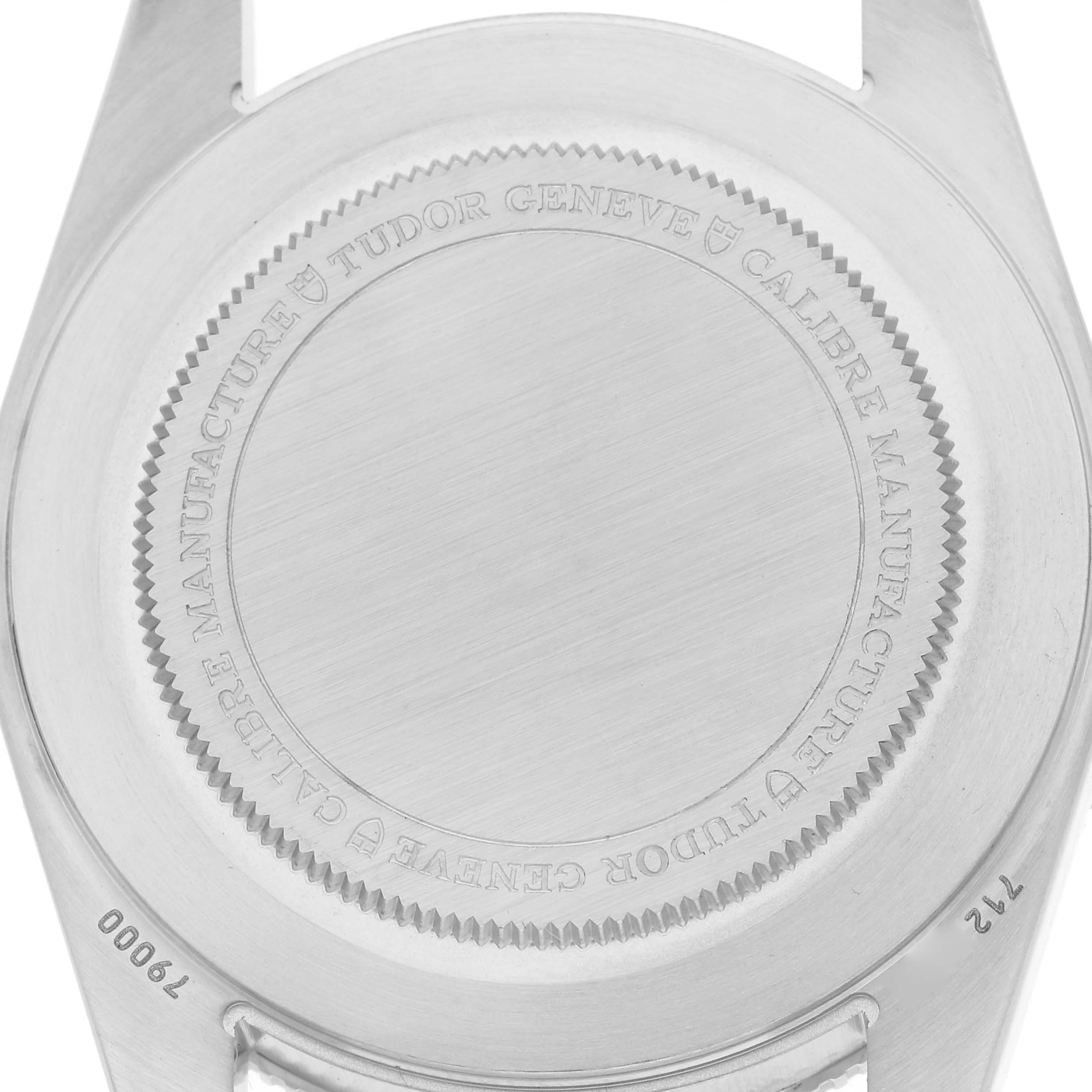 The image shows the case back of a Tudor Heritage Black Bay model number 79000 watch, viewed from the rear angle, displaying engravings and model number.