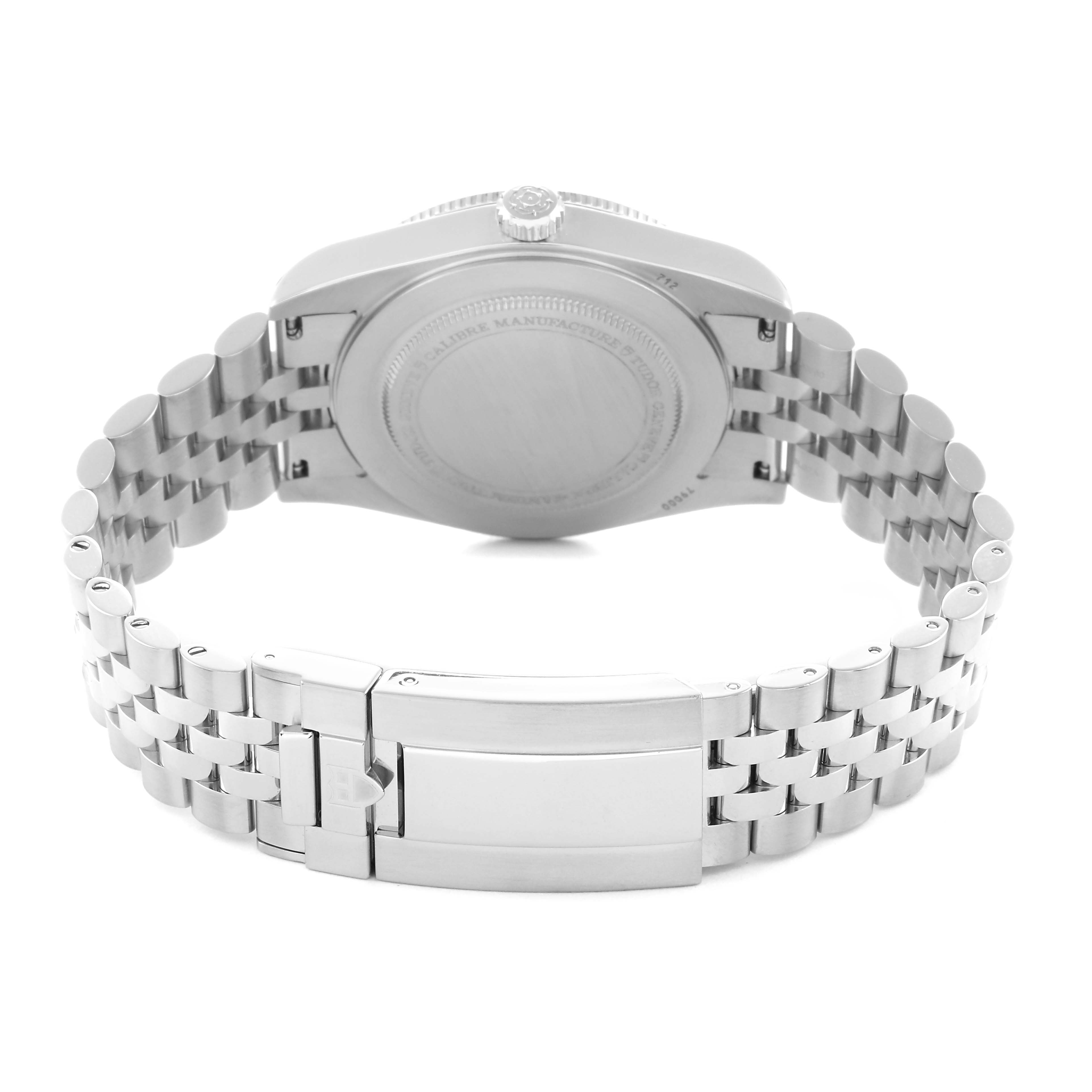 The image shows the back view of the Tudor Heritage Black Bay model 79000, highlighting the case back and bracelet clasp.