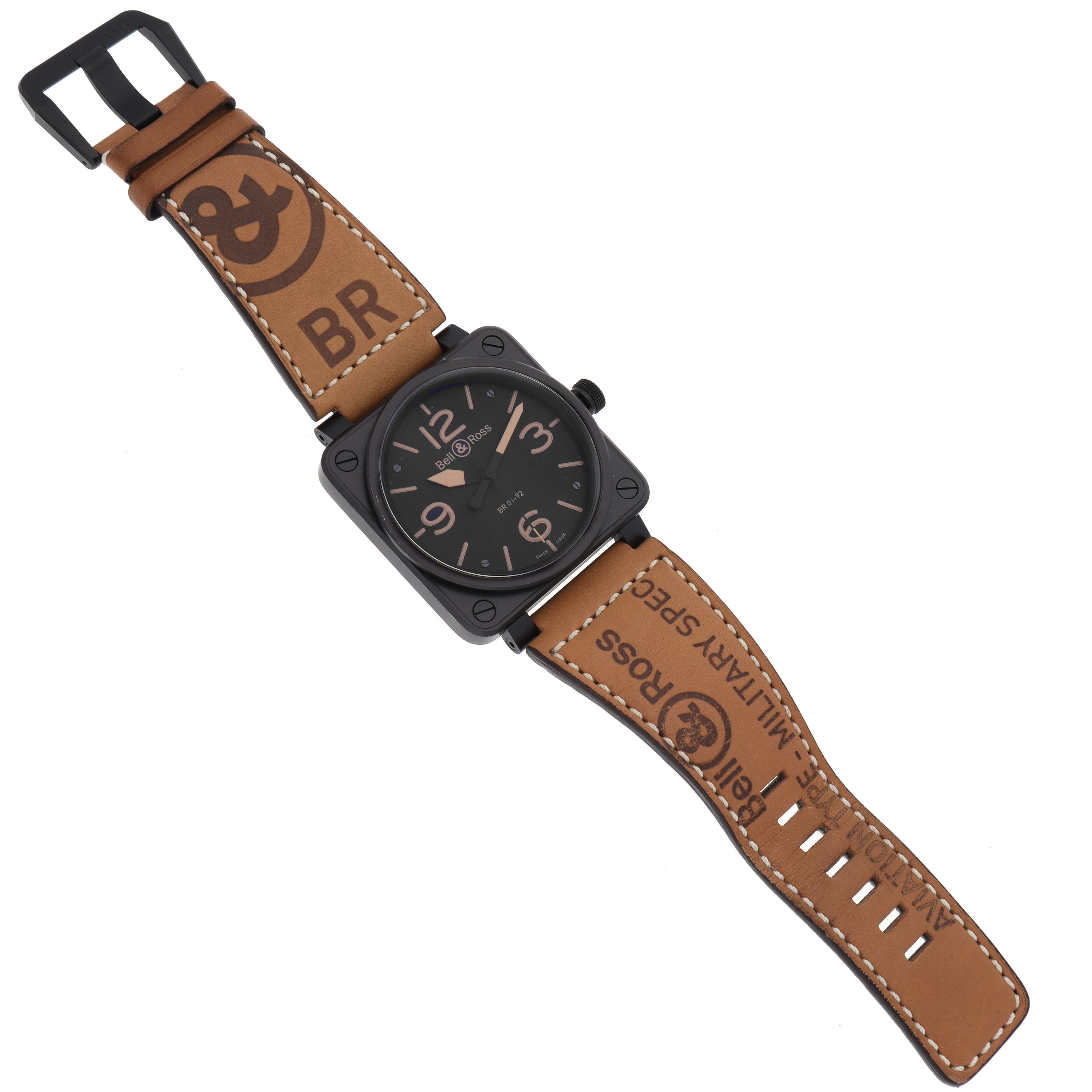 The image shows a top-down view of a Bell & Ross Heritage BR01-92-S Men's Stainless Steel Black Dial BR01-92-S Men's Stainless Steel Black Dial model watch with a tan leather strap and black square case.