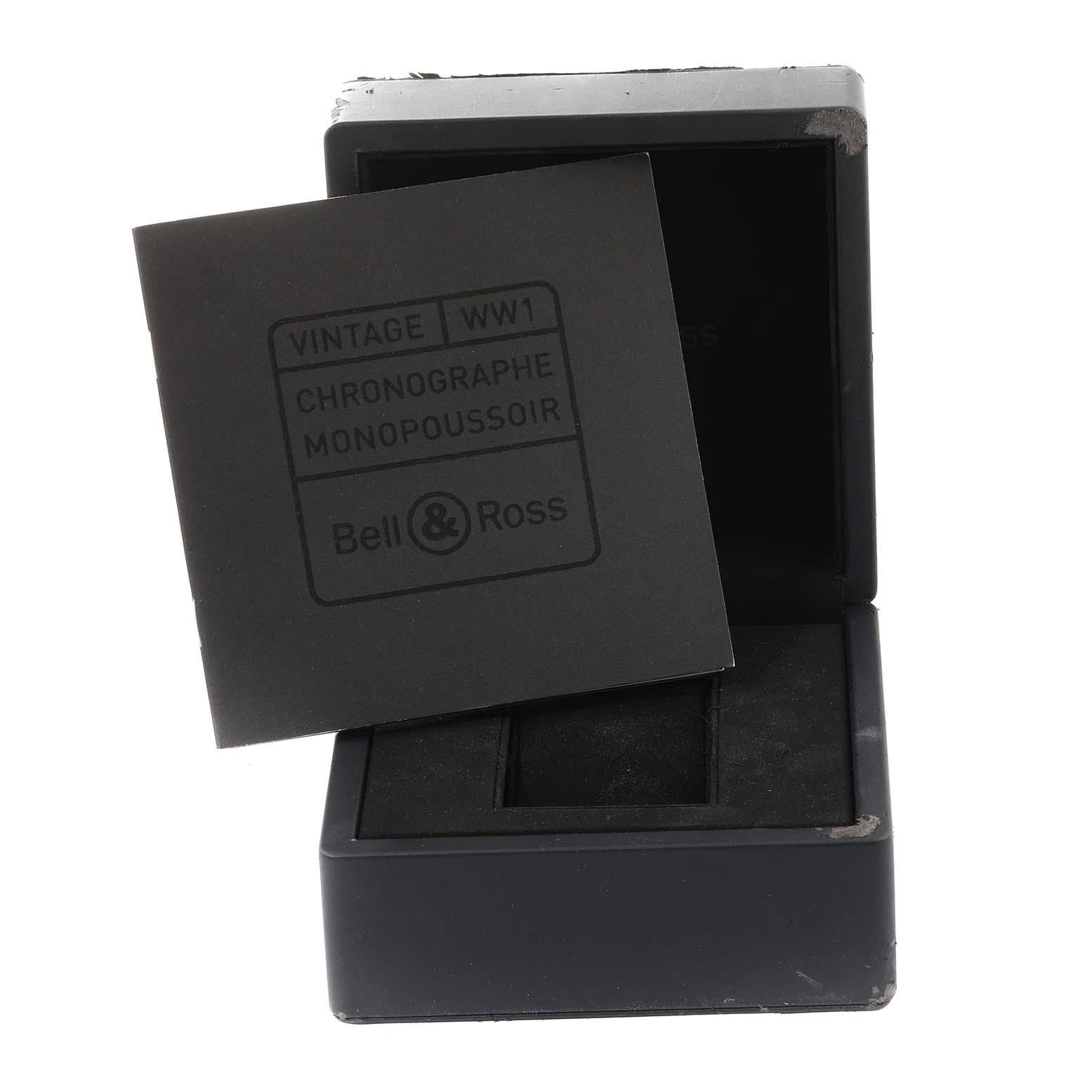 The image shows the box and packaging of a Bell & Ross Heritage BRWW1-MP01 Men's Stainless Steel Black Dial BRWW1-MP01 Men's Stainless Steel Black Dial model watch from an angled perspective.