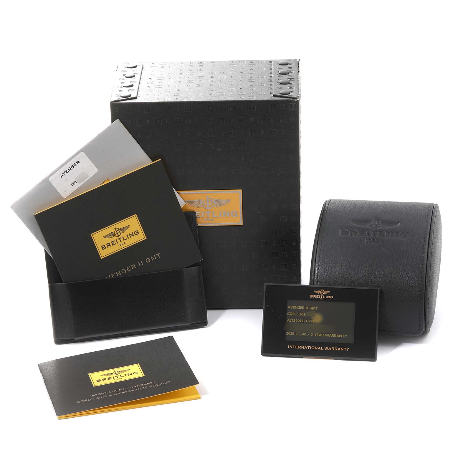 The image shows the packaging, warranty card, manuals, and a leather case for the Breitling Avenger A32390 Men's Stainless Steel White Dial A32390 Men's Stainless Steel White Dial II GMT watch.