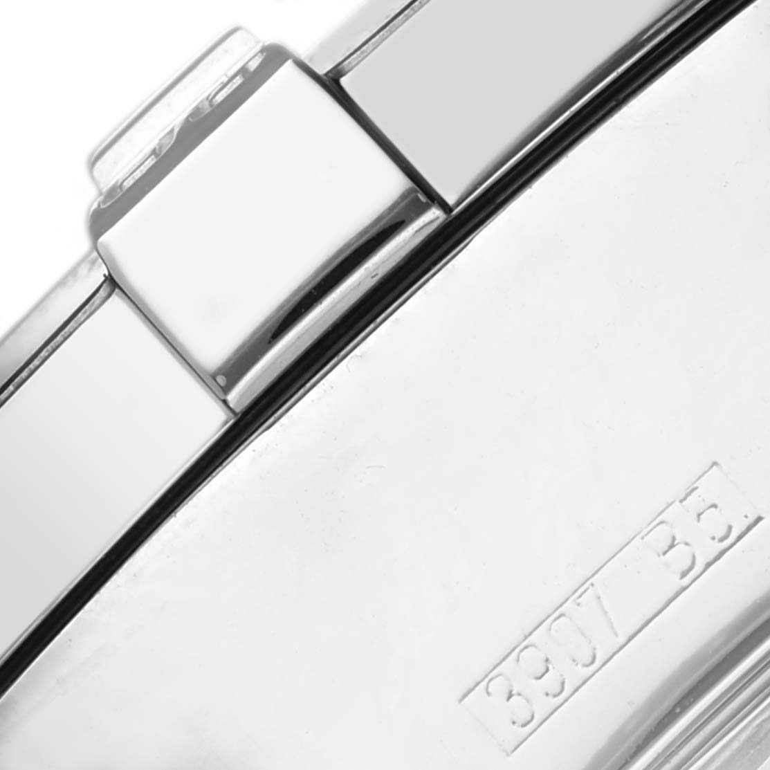 This close-up image of the Breitling Superocean A13340 Men's Stainless Steel Grey Dial A13340 Men's Stainless Steel Grey Dial model shows part of the clasp and a serial number on the case back.