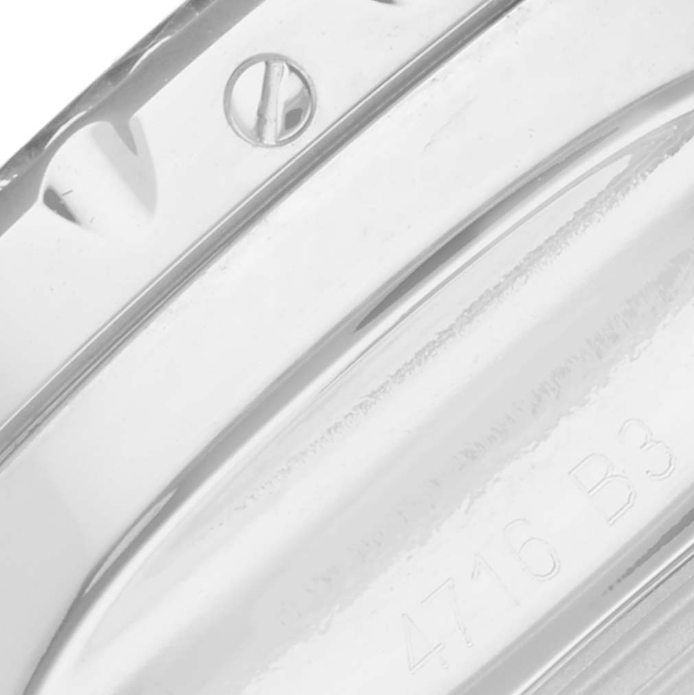 This close-up image shows the edge of the Breitling Bentley A1336212/A726 Men
s Stainless Steel White Dial A1336212/A726 Men
s Stainless Steel White Dial model watch case with visible screws and part of the serial number.