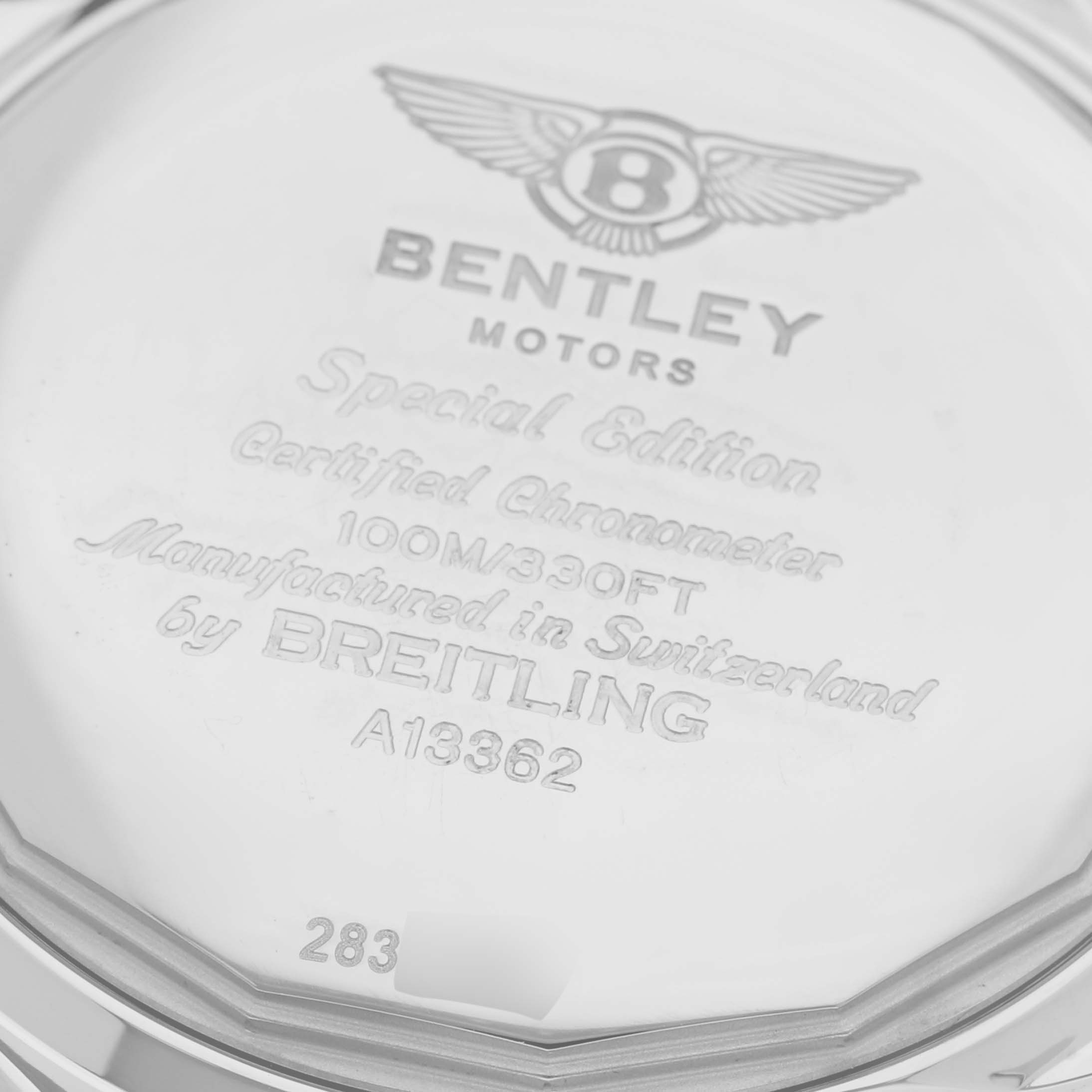 The image shows the back case of the Breitling Bentley A1336212/A726 Men
s Stainless Steel White Dial A1336212/A726 Men
s Stainless Steel White Dial model watch, featuring engraved specifications and branding.