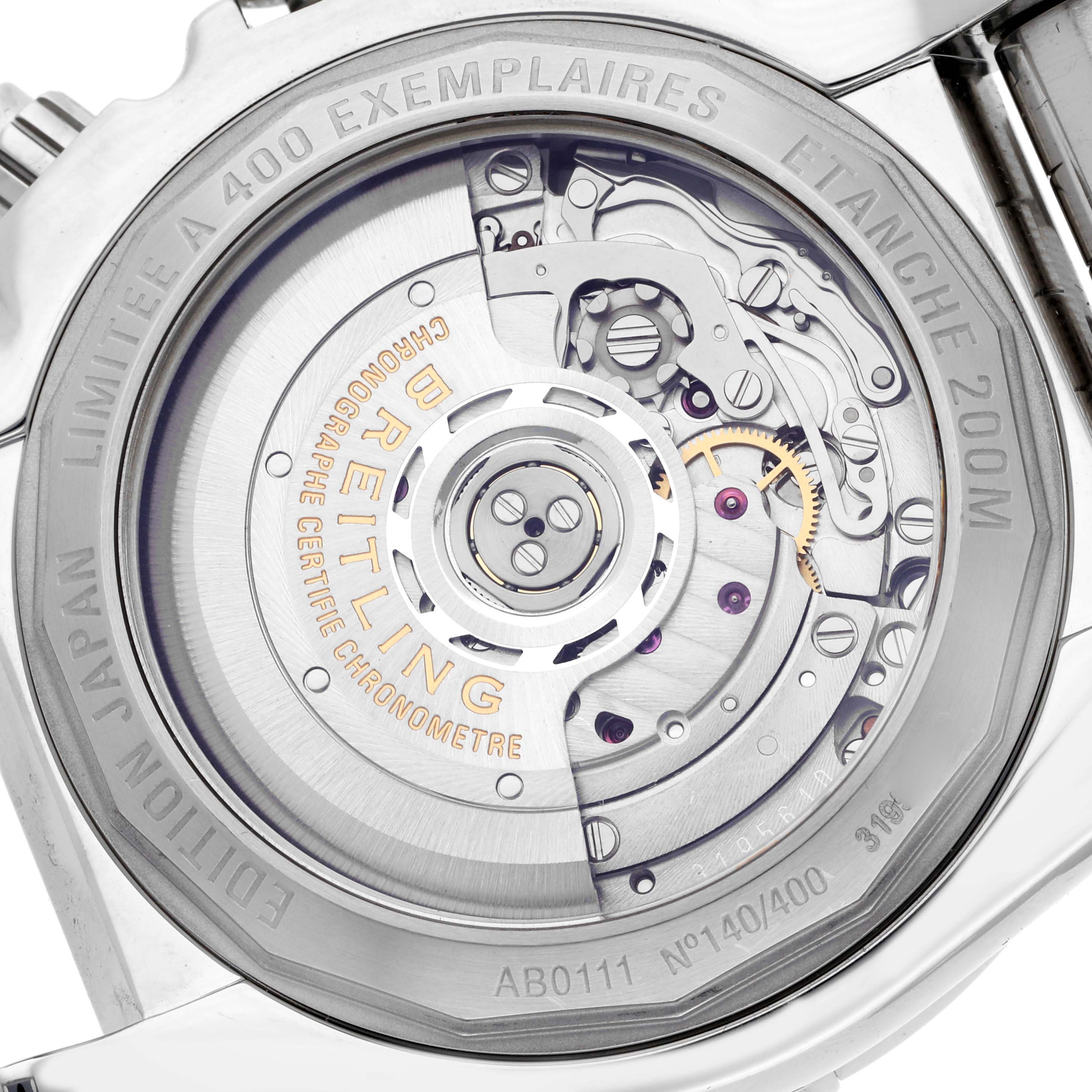 The image shows the case back of the Breitling Chronomat model AB0111, displaying its intricate movement and engraved details, limited to 400 examples.