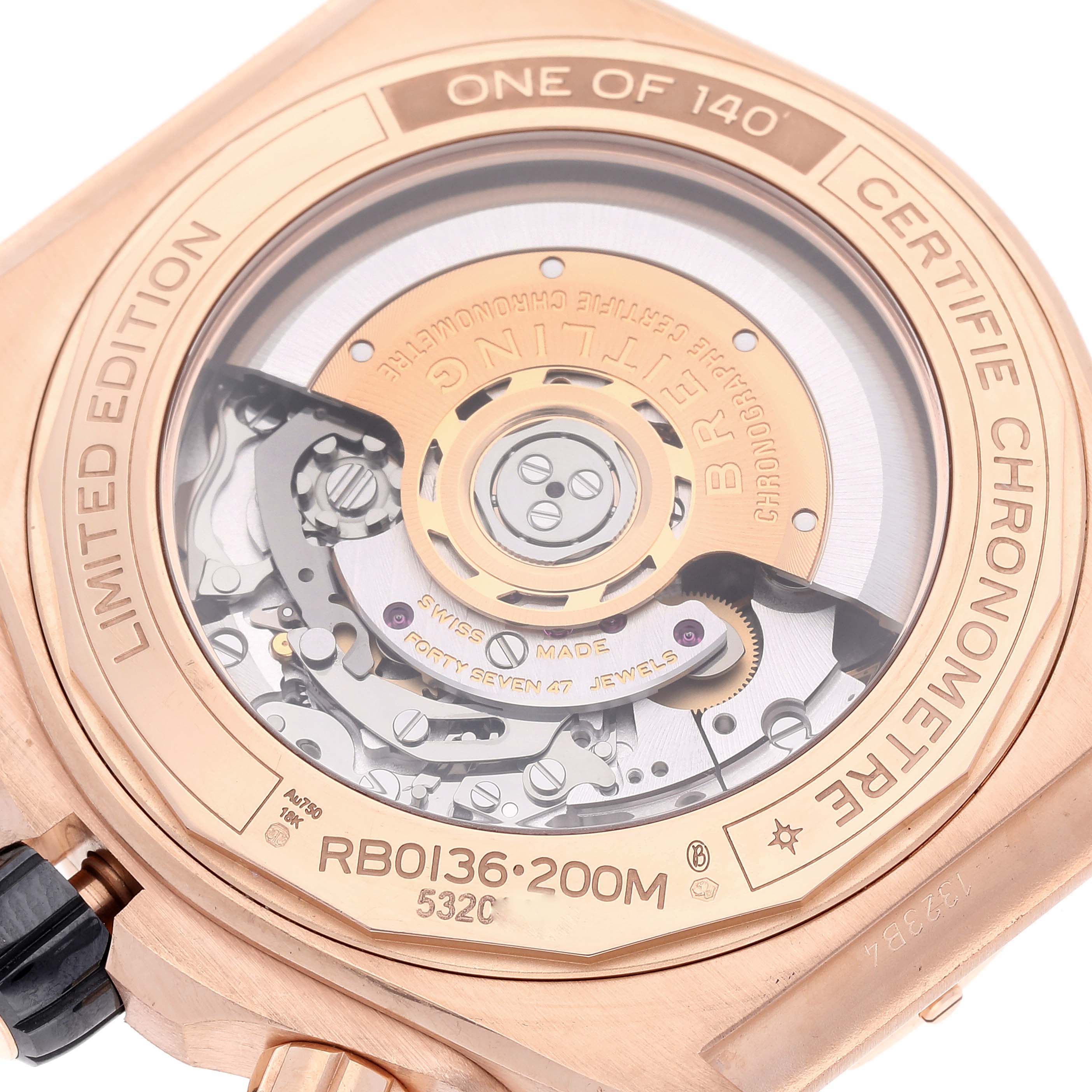 The image shows the backside of the Breitling Chronomat RB0136 Men's Rose Gold Blue Dial RB0136 Men's Rose Gold Blue Dial watch, highlighting its open case back with visible movement and engravings.