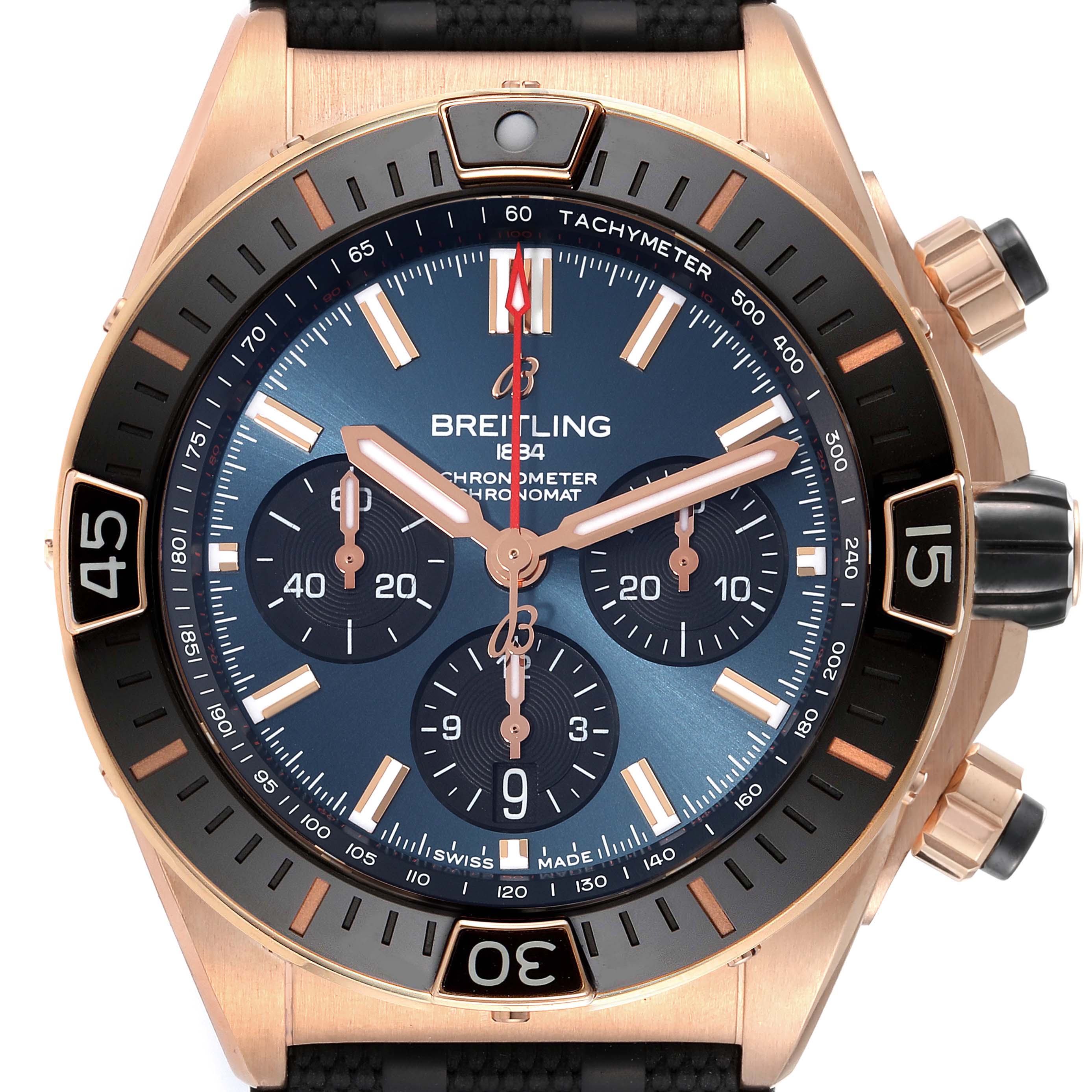The Breitling Chronomat RB0136 Men's Rose Gold Blue Dial RB0136 Men's Rose Gold Blue Dial watch is shown from a front angle, displaying its face, bezel, and chronograph dials.