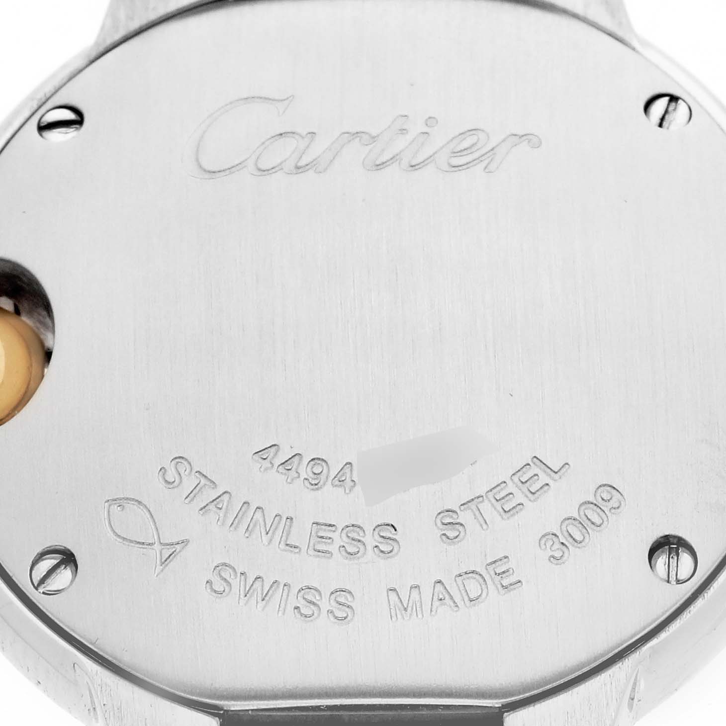 The image shows the back of a Cartier Ballon Bleu watch, model number W69007Z3, displaying engravings and a portion of the case screws.