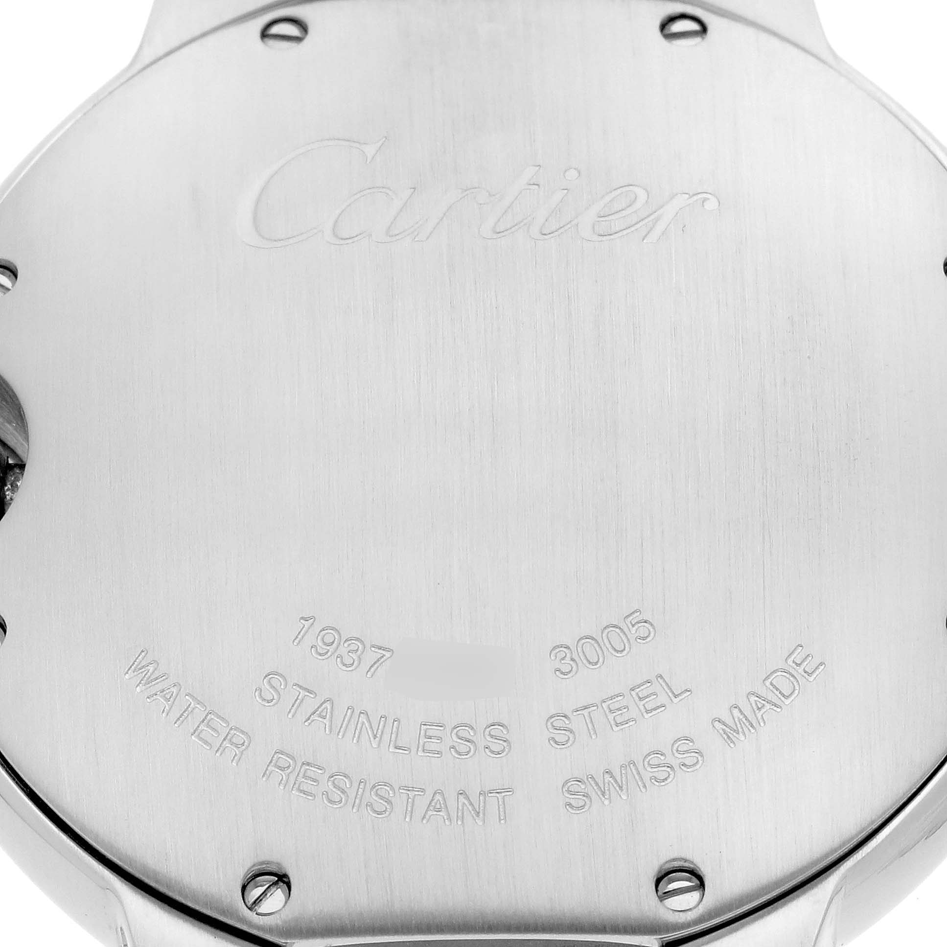 The image shows the back case of a Cartier Ballon Bleu model W69011Z4 men's watch, highlighting its stainless steel material and engraved details.
