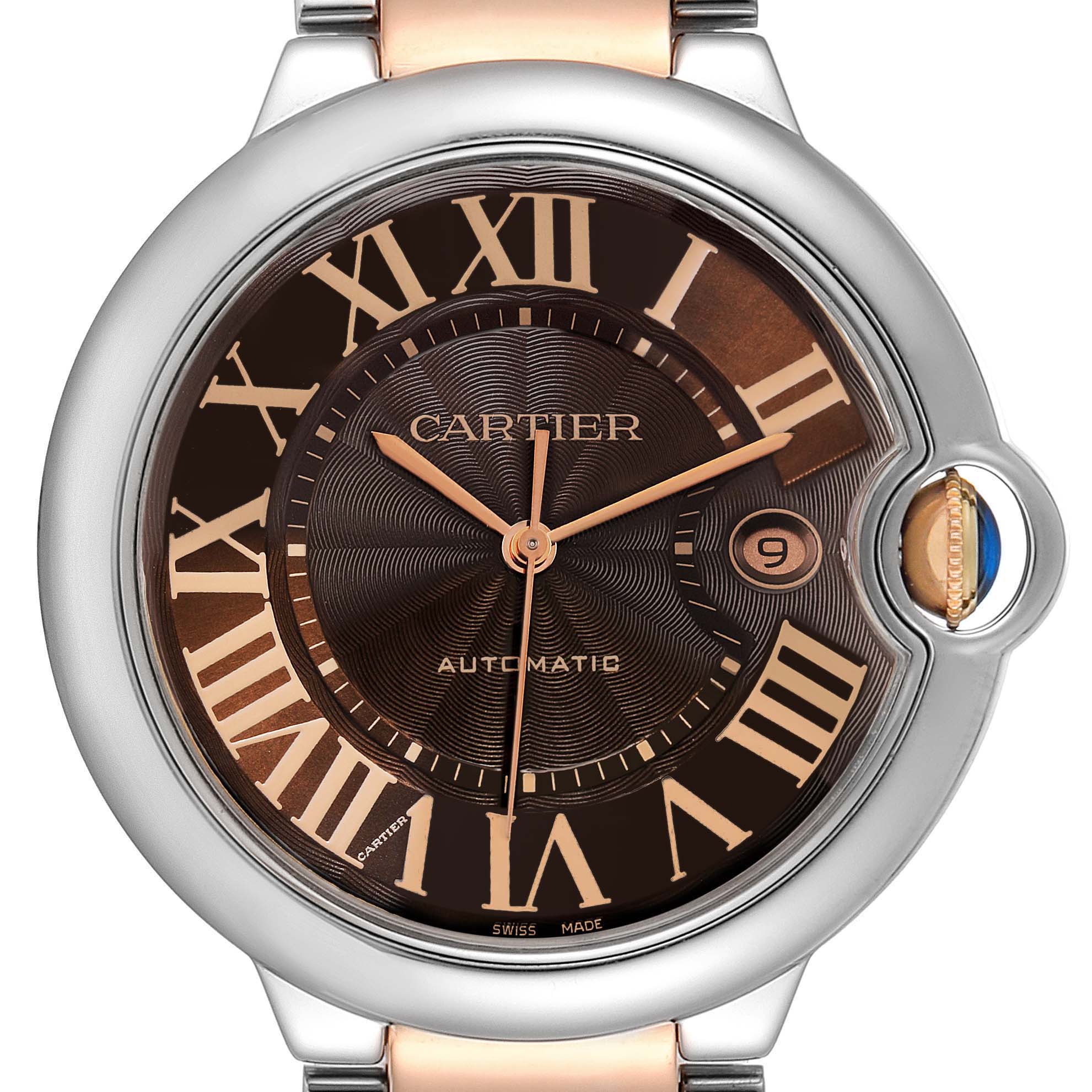 The image shows a close-up view of the Cartier Ballon Bleu W6920032 Men's Steel and Gold (two tone) Brown Dial W6920032 Men's Steel and Gold (two tone) Brown Dial watch, highlighting its dial, hands, and date feature.
