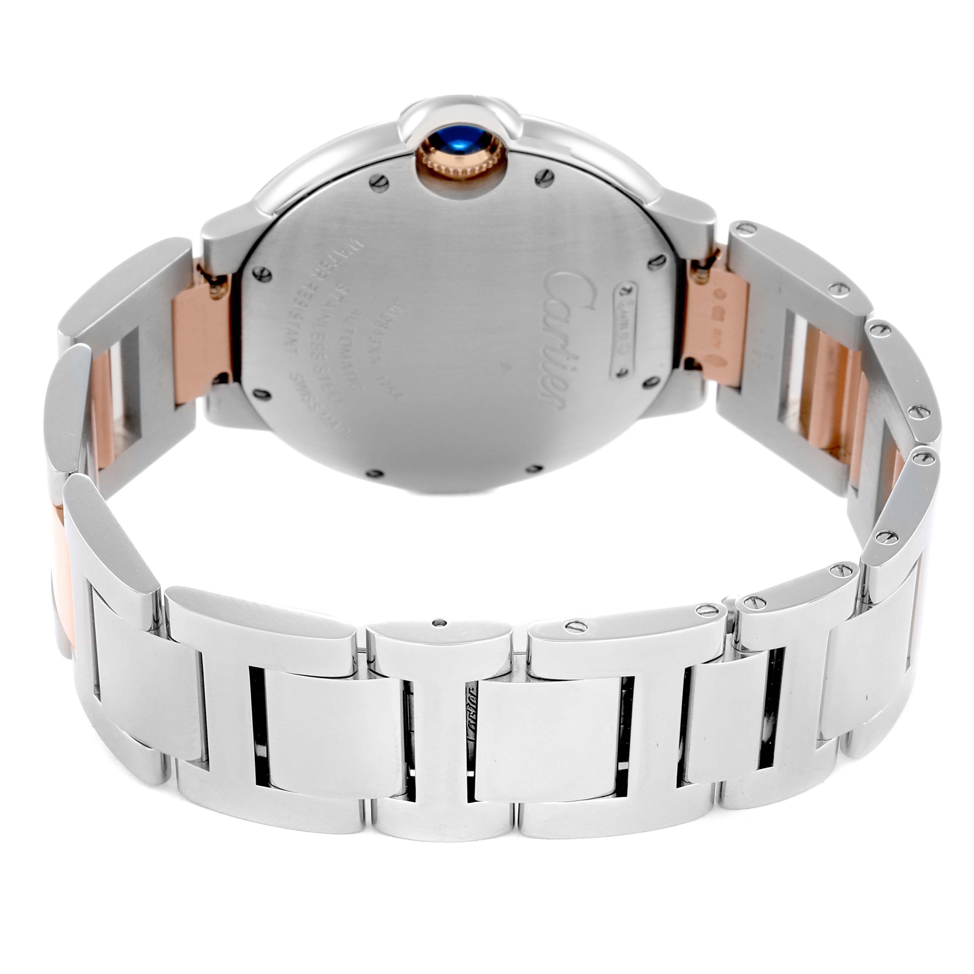 The image shows a rear view of the Cartier Ballon Bleu Men's watch, model number W3BB0004, highlighting the case back and silver bracelet.