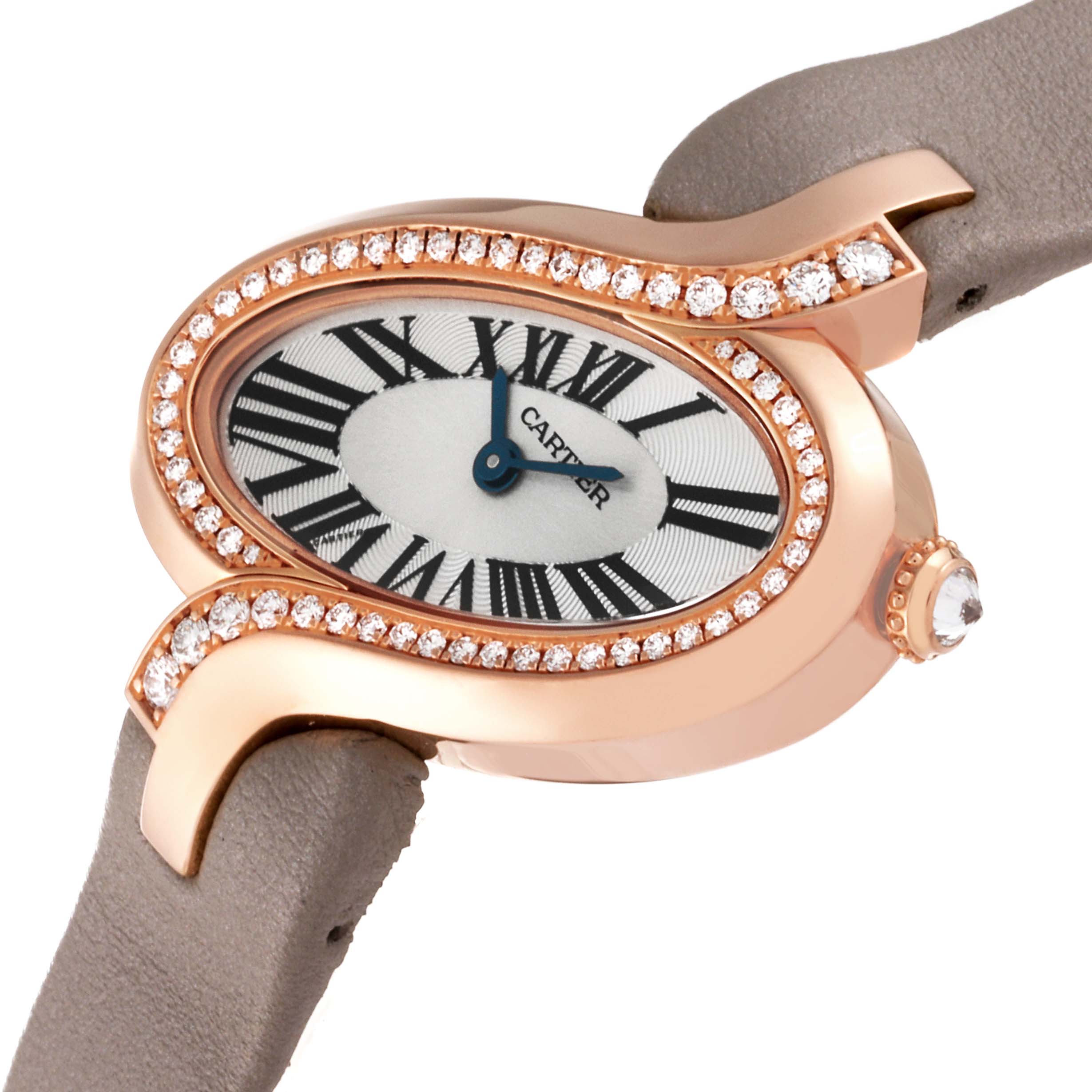 The image shows a close-up side angle of the Cartier Delices WG800013 Women
s Rose Gold Silver Dial WG800013 Women
s Rose Gold Silver Dial watch, highlighting the diamond-encrusted bezel, face, and crown.
