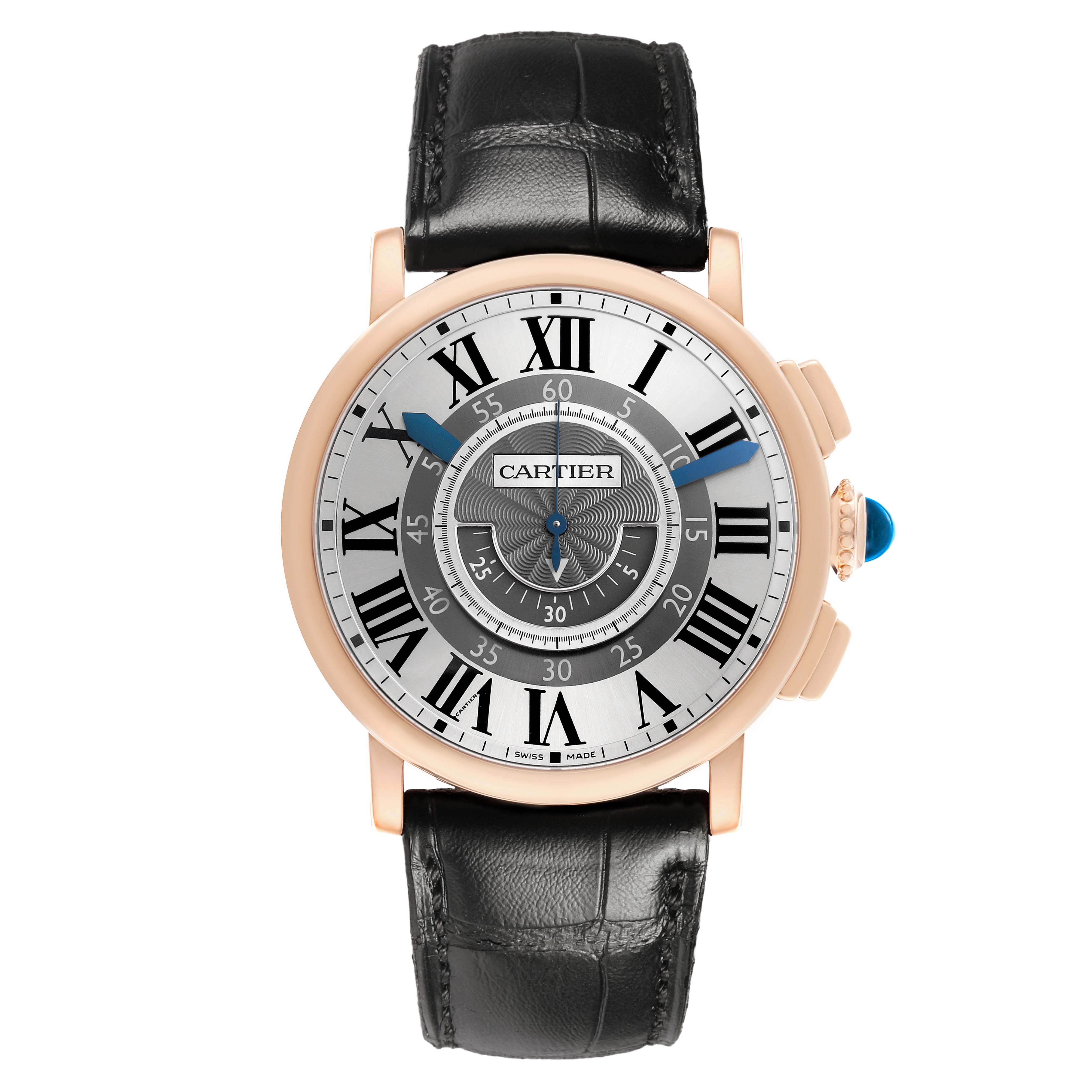 The Rotonde de Cartier watch is shown from a top view, highlighting its dial, Roman numerals, blue hands, gold case, and black leather strap.