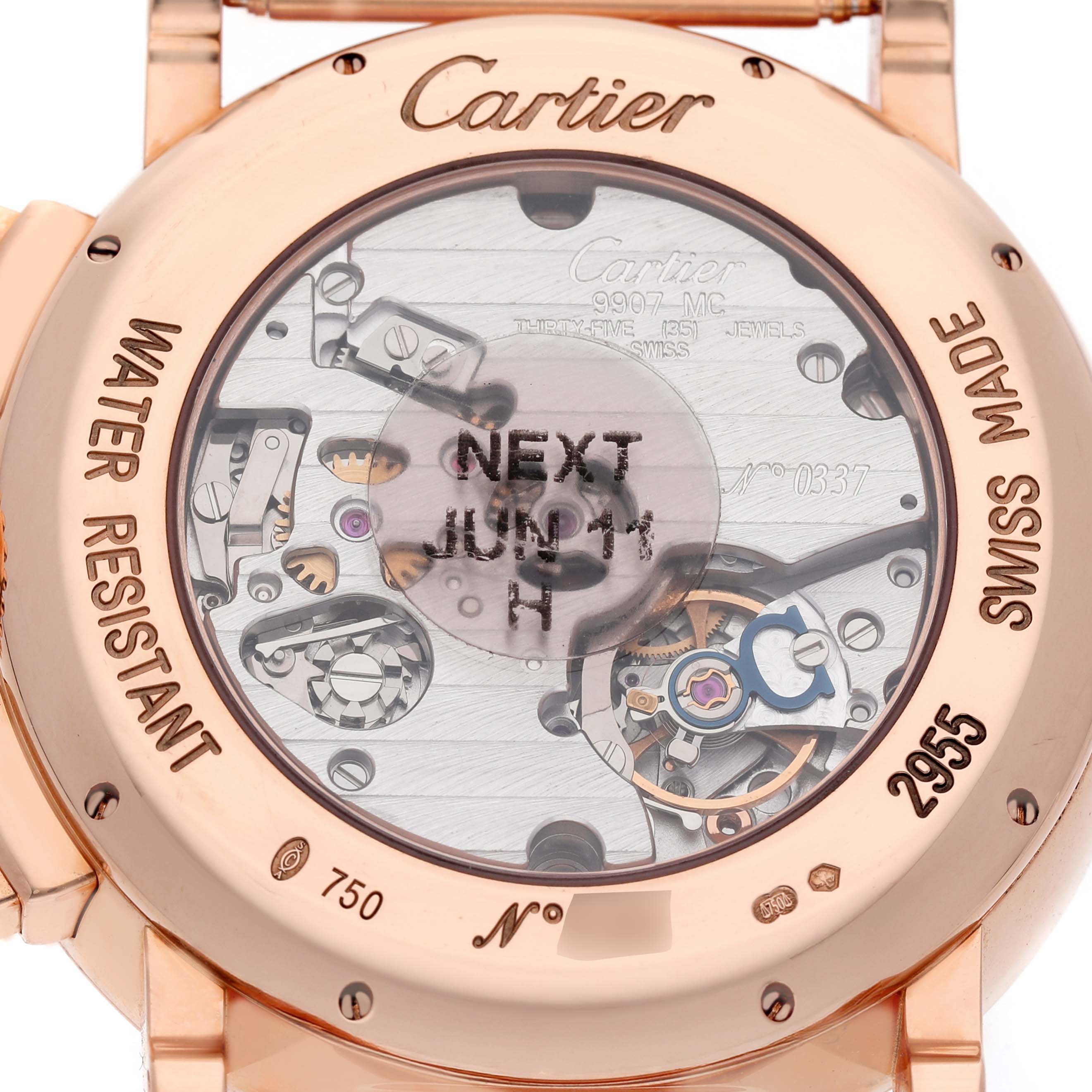 The image shows the back of a Cartier Rotonde W1555951 Men's Rose Gold Silver Dial watch, highlighting the movement and engravings on the case.