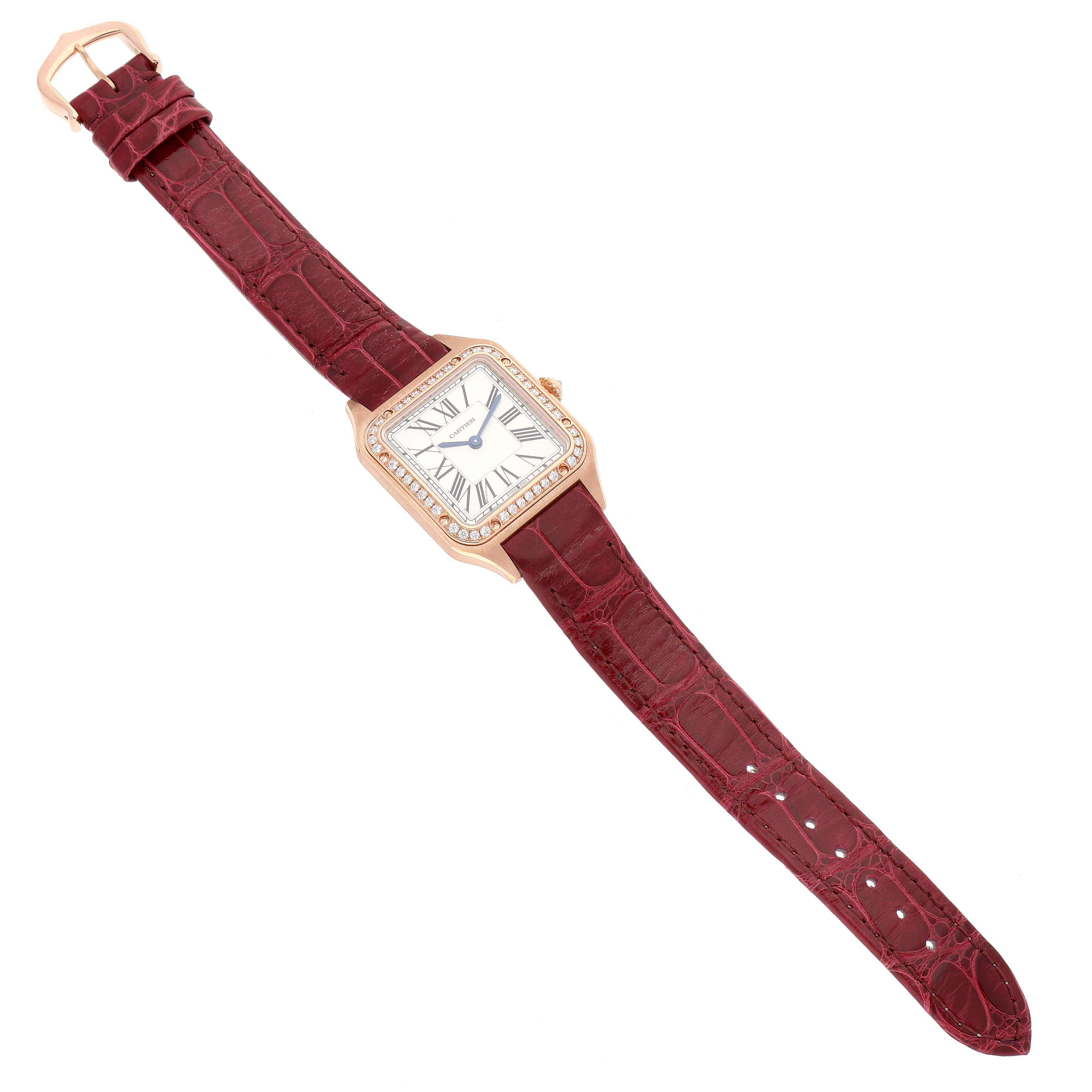 The image shows a full view of the Cartier Santos WJSA0017 Women's Rose Gold Silver Dial WJSA0017 Women's Rose Gold Silver Dial watch lying flat, displaying the face, case, crown, and entire strap.