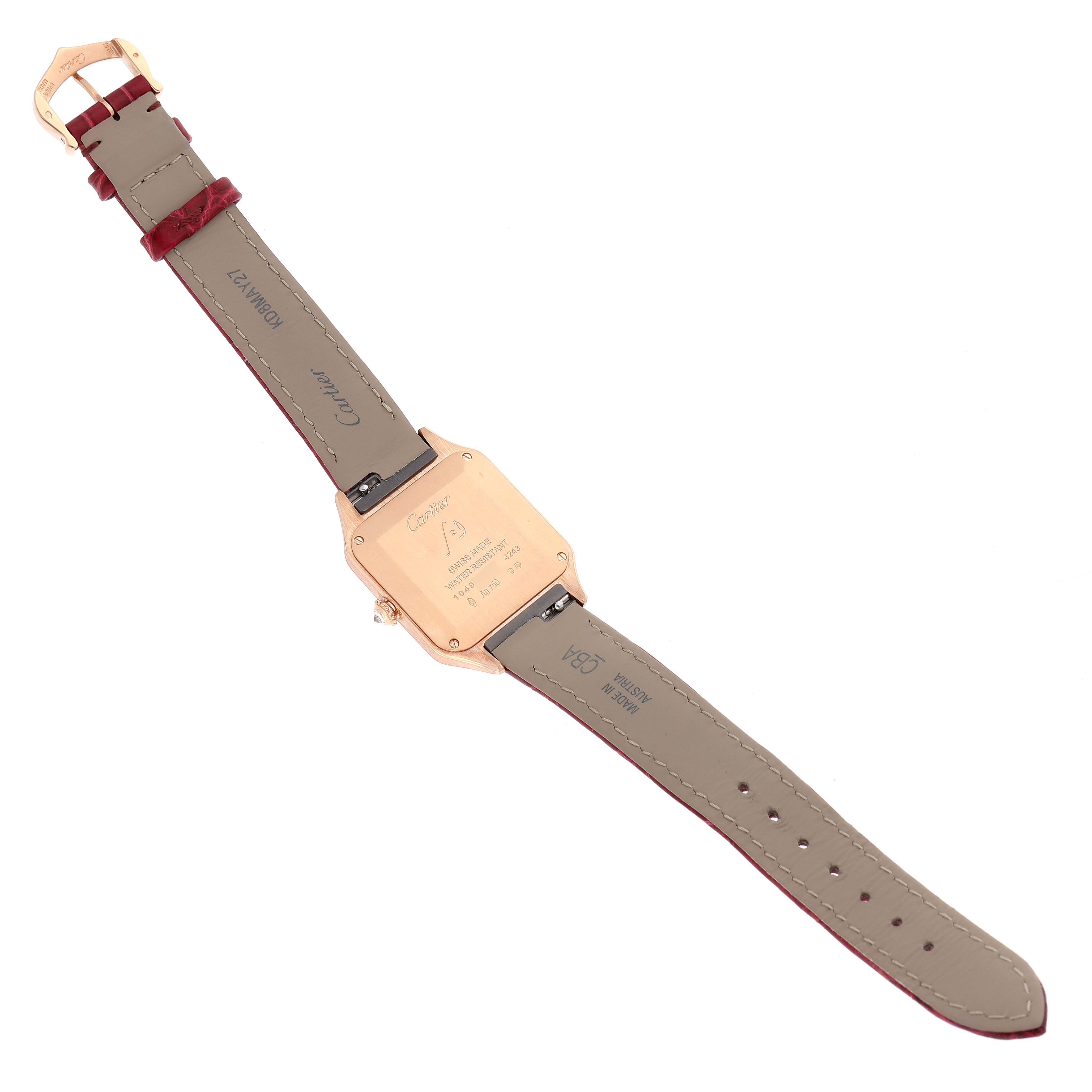 The image shows the back side of a Cartier Santos WJSA0017 Women's Rose Gold Silver Dial WJSA0017 Women's Rose Gold Silver Dial watch, featuring the case back and leather straps.
