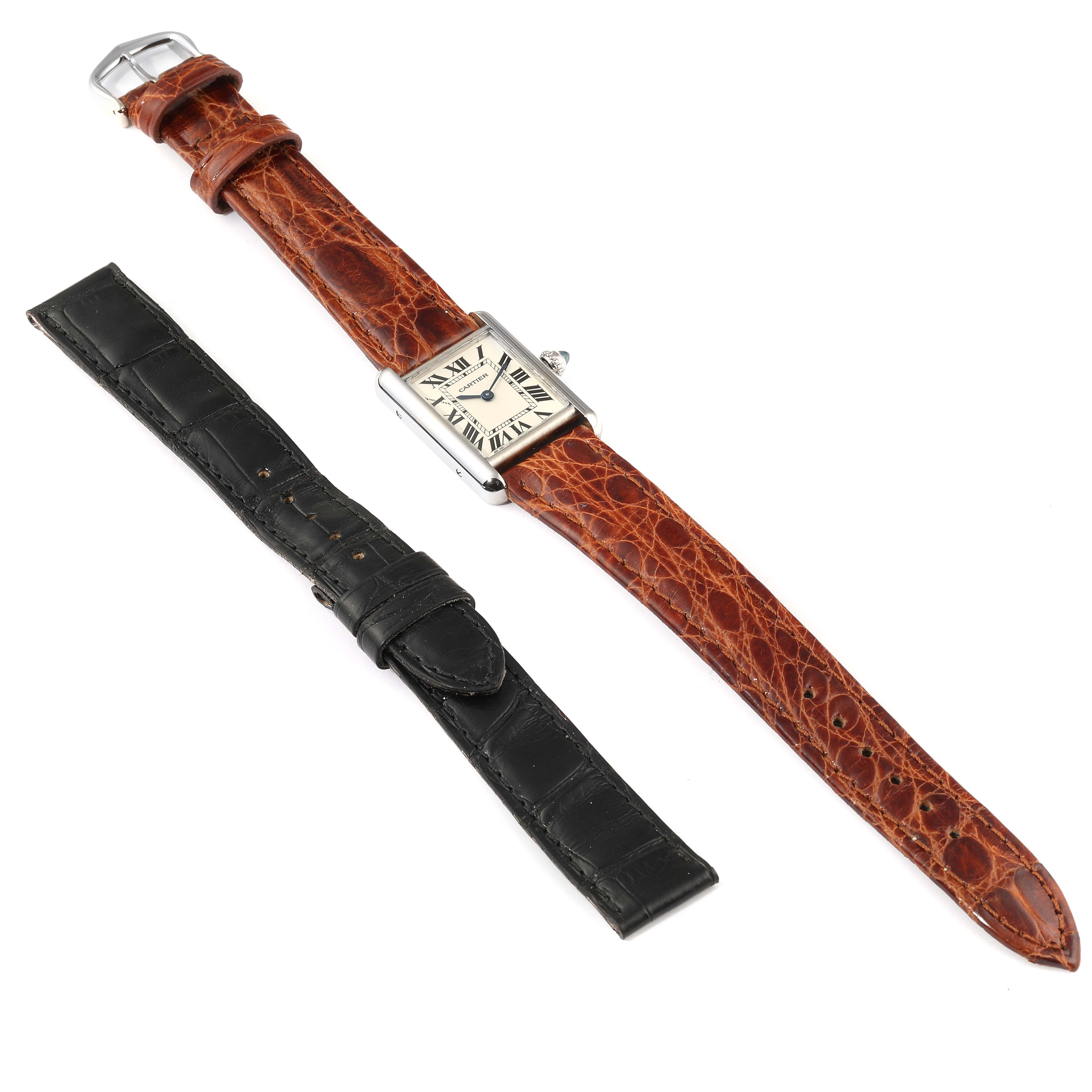 The image shows the Cartier Tank Louis W1541056 Women
s White Gold Silver Dial W1541056 Women
s White Gold Silver Dial watch with a brown leather strap and a detached black leather strap accessory, arranged side by side.