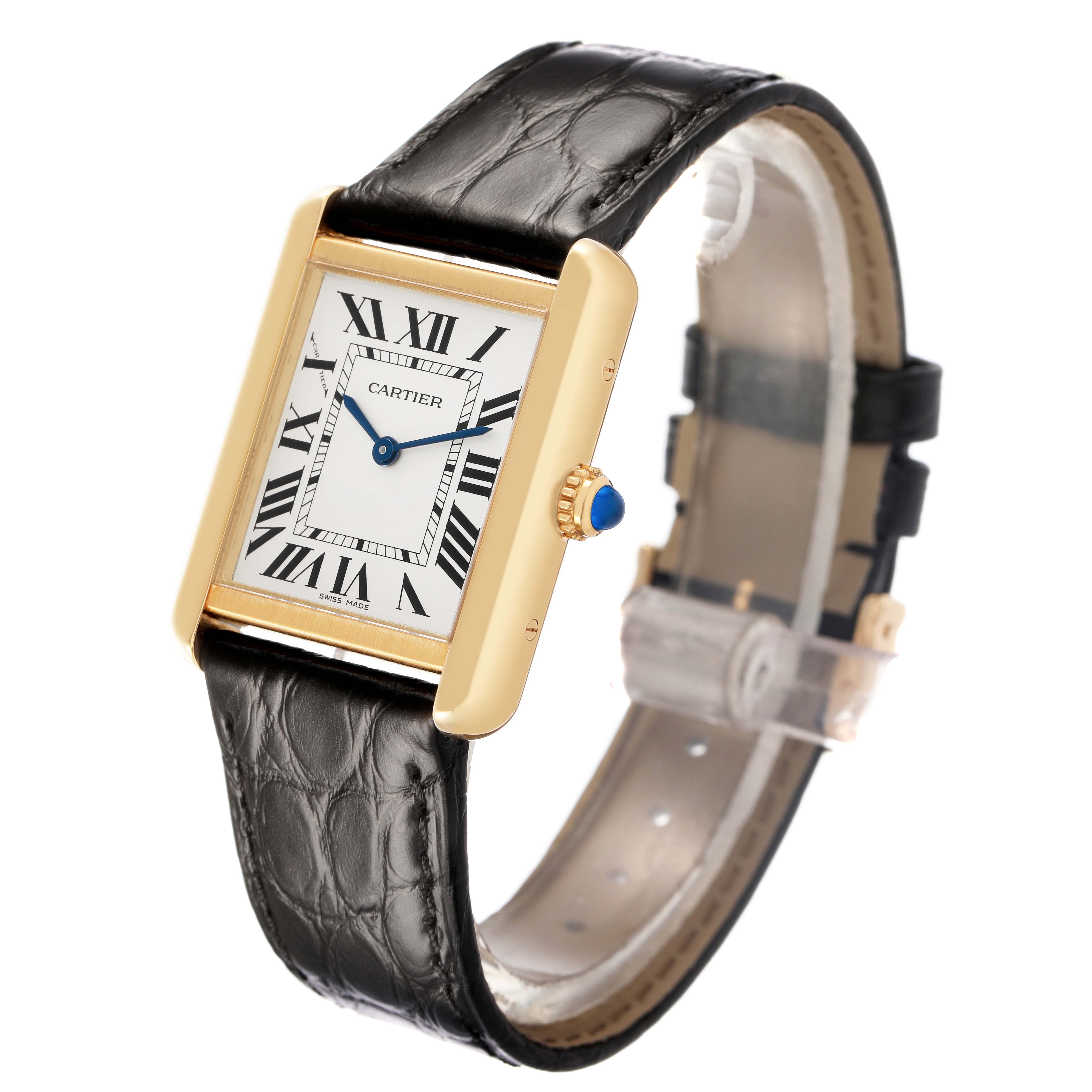 The Cartier Tank Solo W5200024 Women's Yellow Gold Silver Dial watch is shown at a three-quarter angle, highlighting its rectangular face, blue hands, leather strap, and crown.