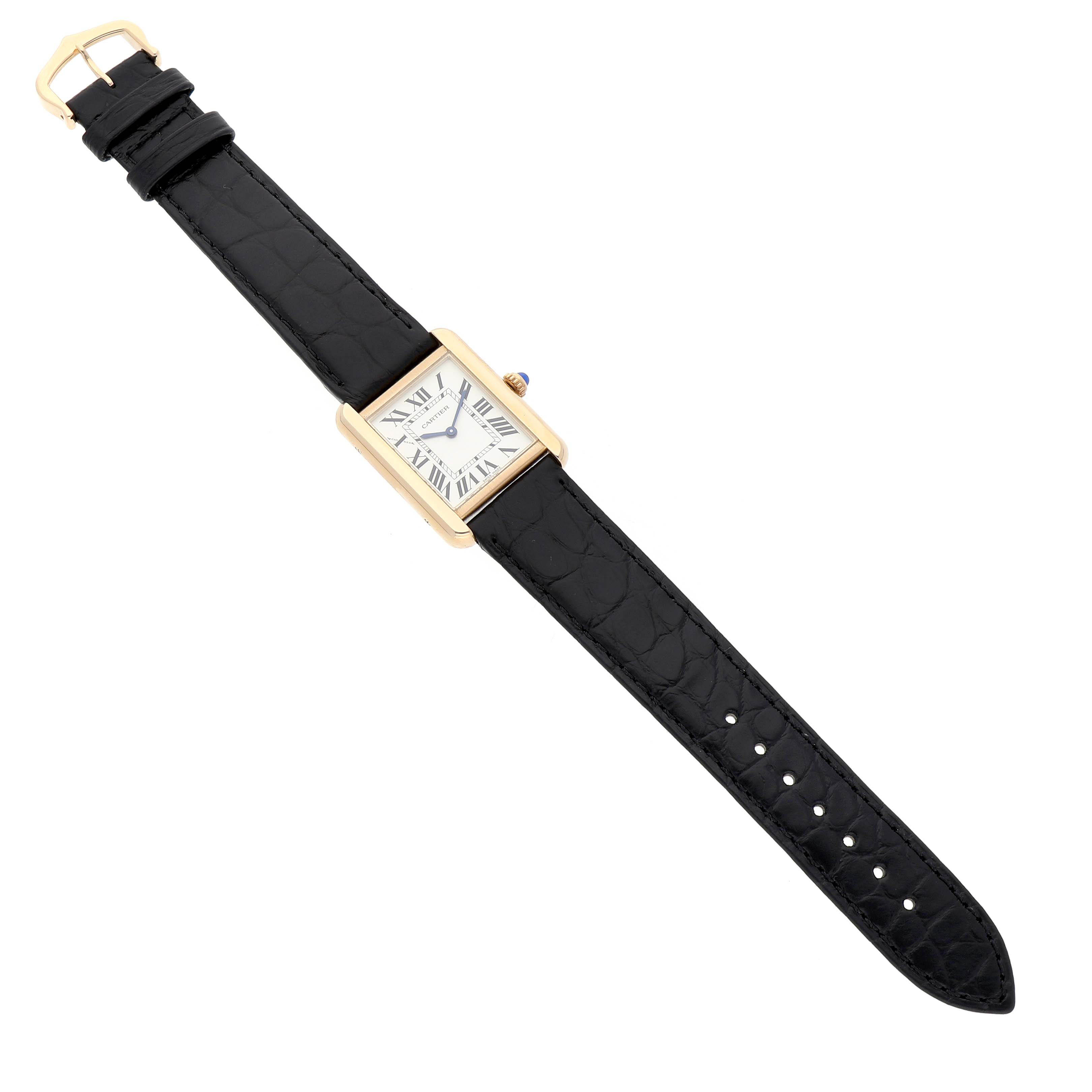 The Cartier Tank Solo W5200024 Women's Yellow Gold Silver Dial watch is shown from a top angle, displaying the face, black leather strap, and gold buckle.