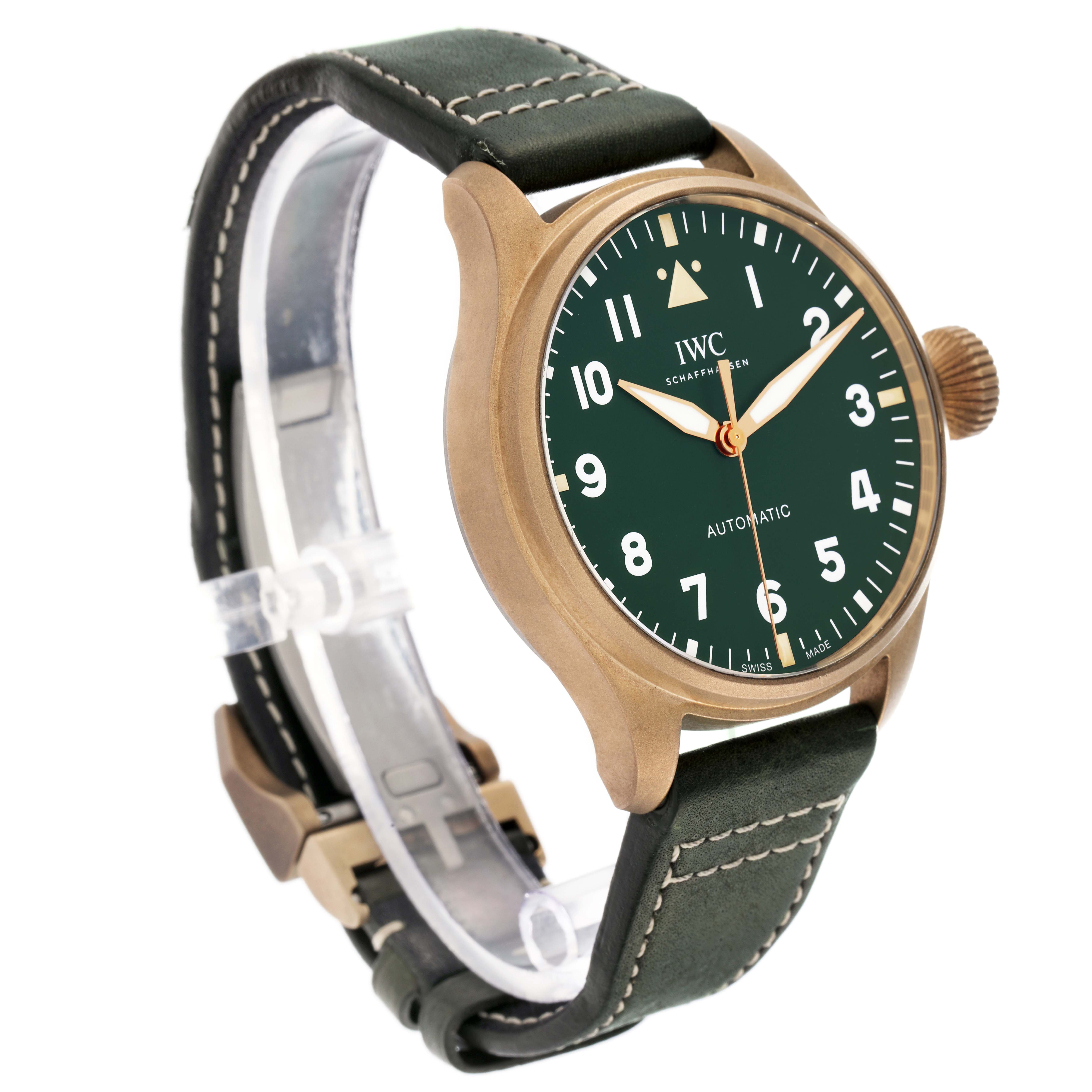 The IWC Pilot model IW329702 watch is shown at a three-quarter angle, highlighting its green dial, bronze case, and leather strap.