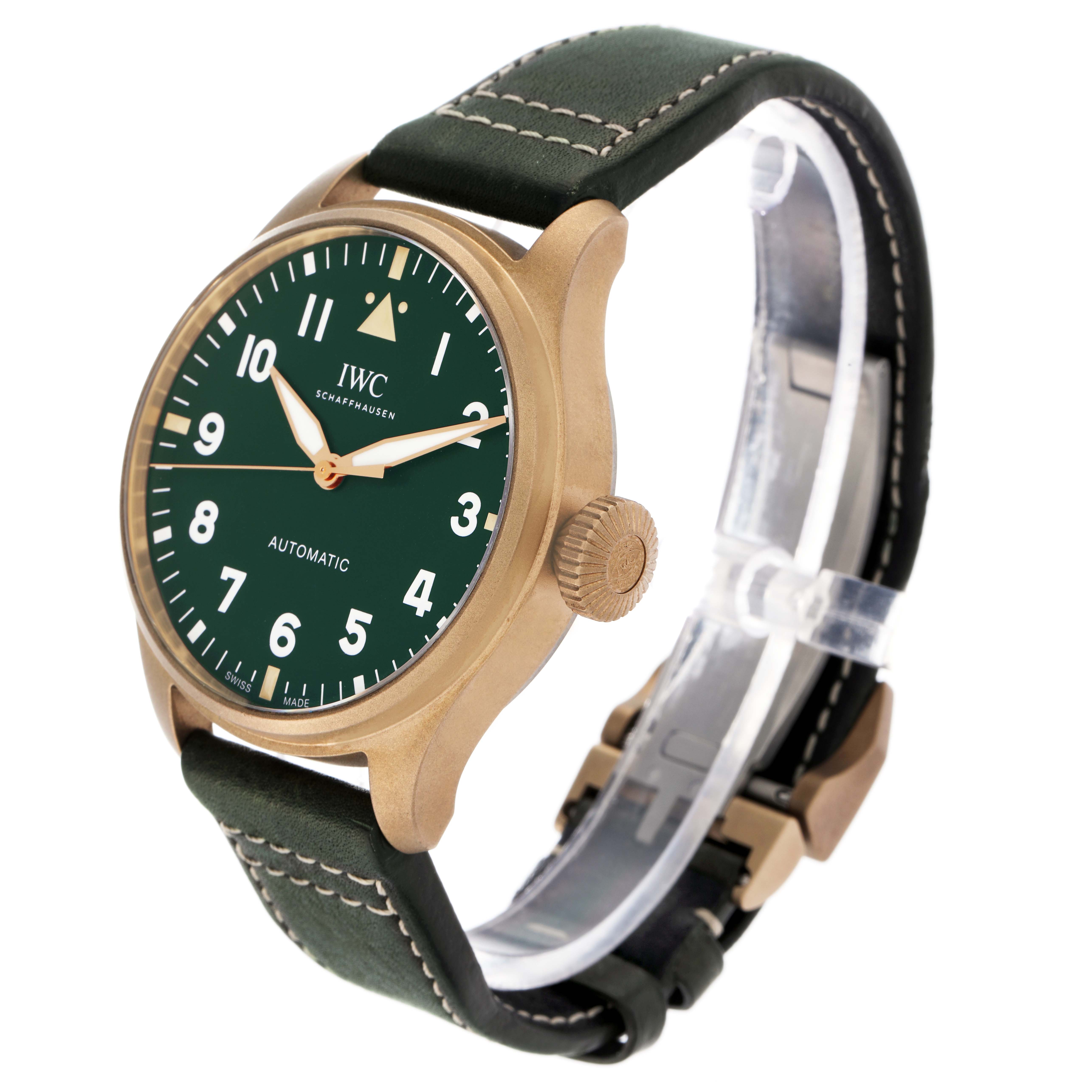 The IWC Pilot model IW329702 is shown at a three-quarter angle, displaying the dial, crown, and part of the leather strap.