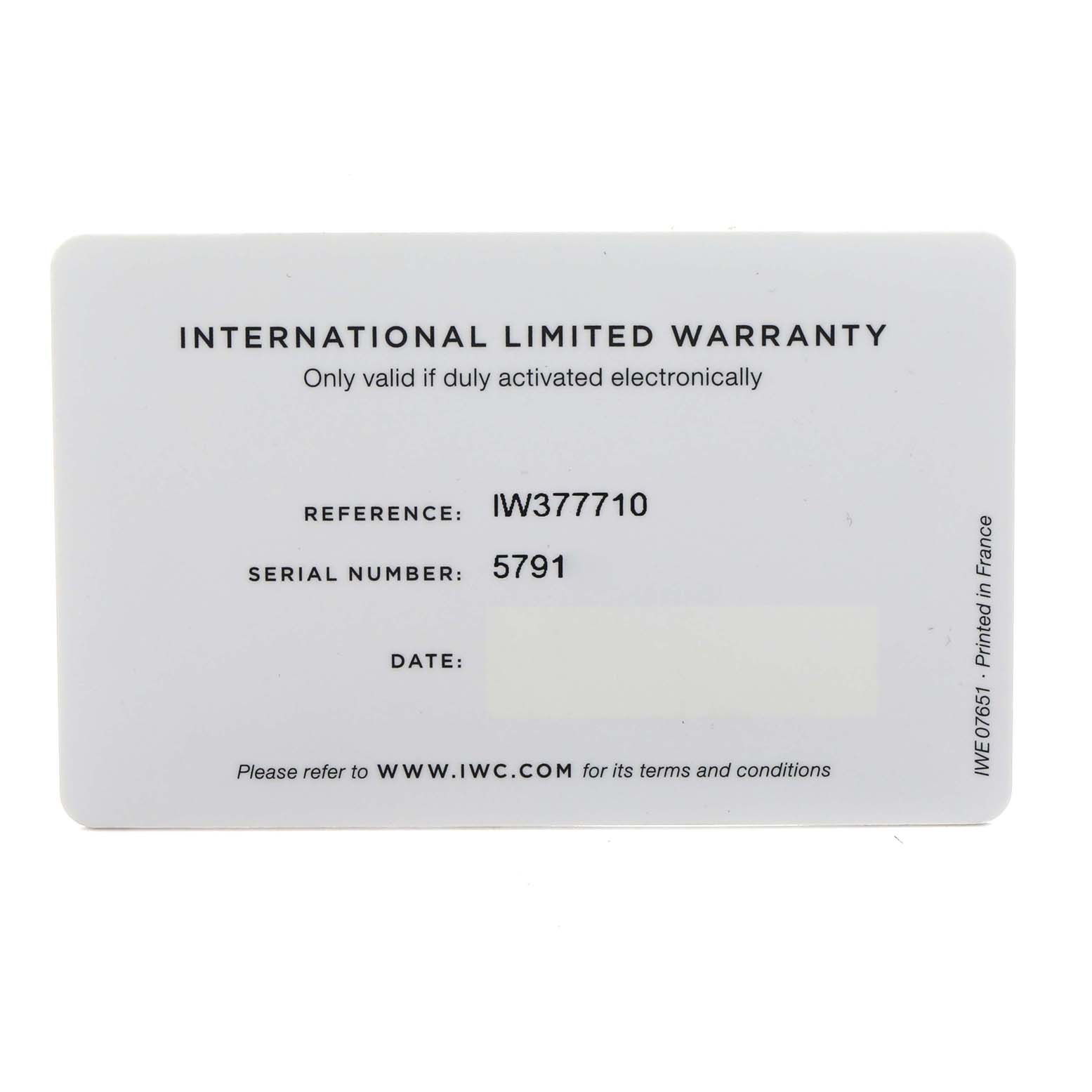 The image shows the warranty card for an IWC Pilot model, model number IW377710, featuring the reference, serial number, and a blank date section.