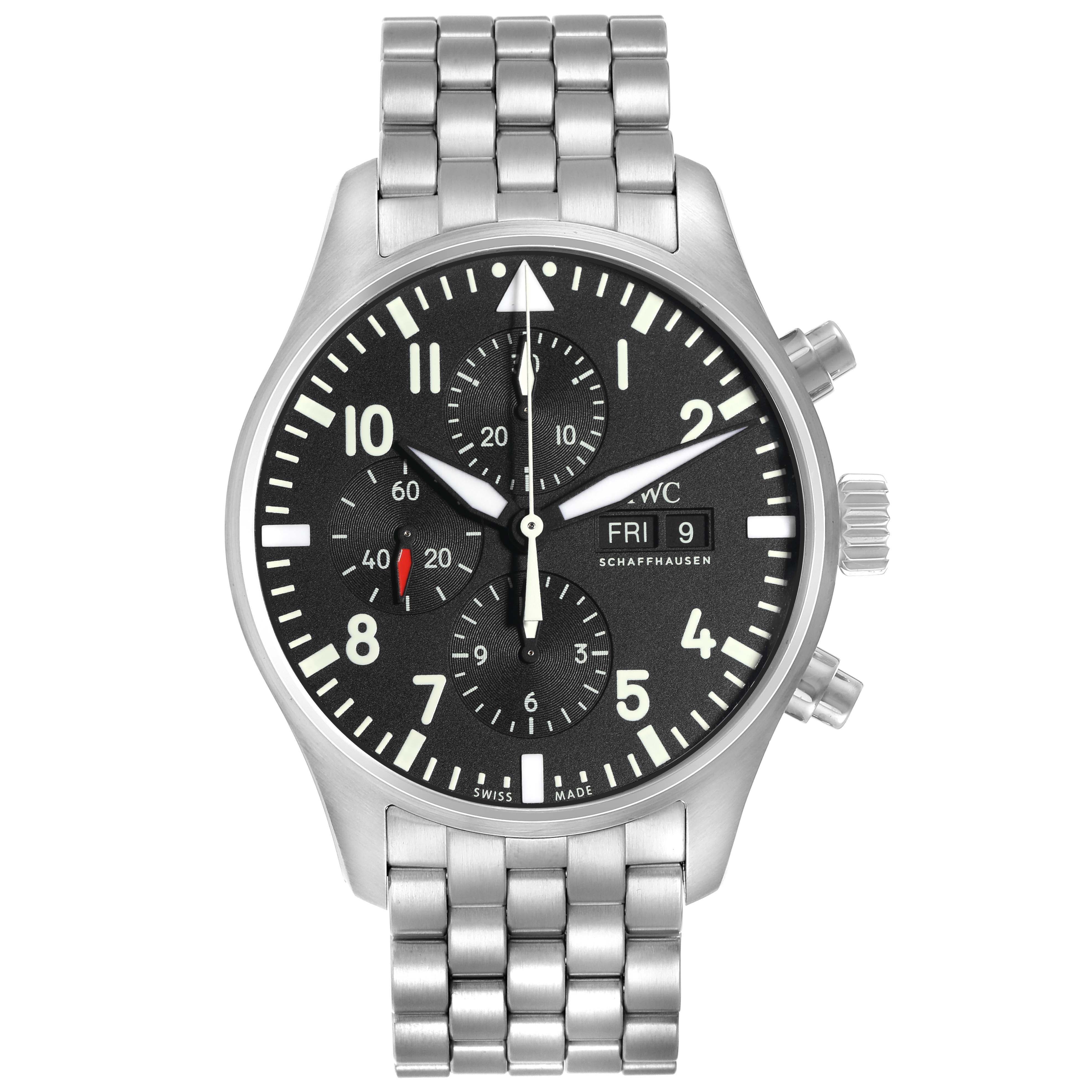 The IWC Pilot model IW377710 is shown from a front angle, displaying its black dial, white markers, chronograph subdials, and stainless steel bracelet clearly.