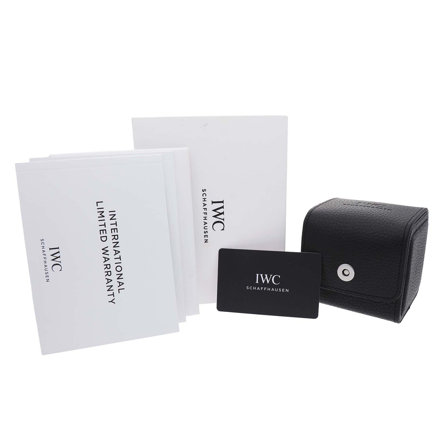 The image shows IWC Portuguese IW358304 Men's Stainless Steel Silver Dial watch accessories, including a warranty card, booklets, and a black leather case.
