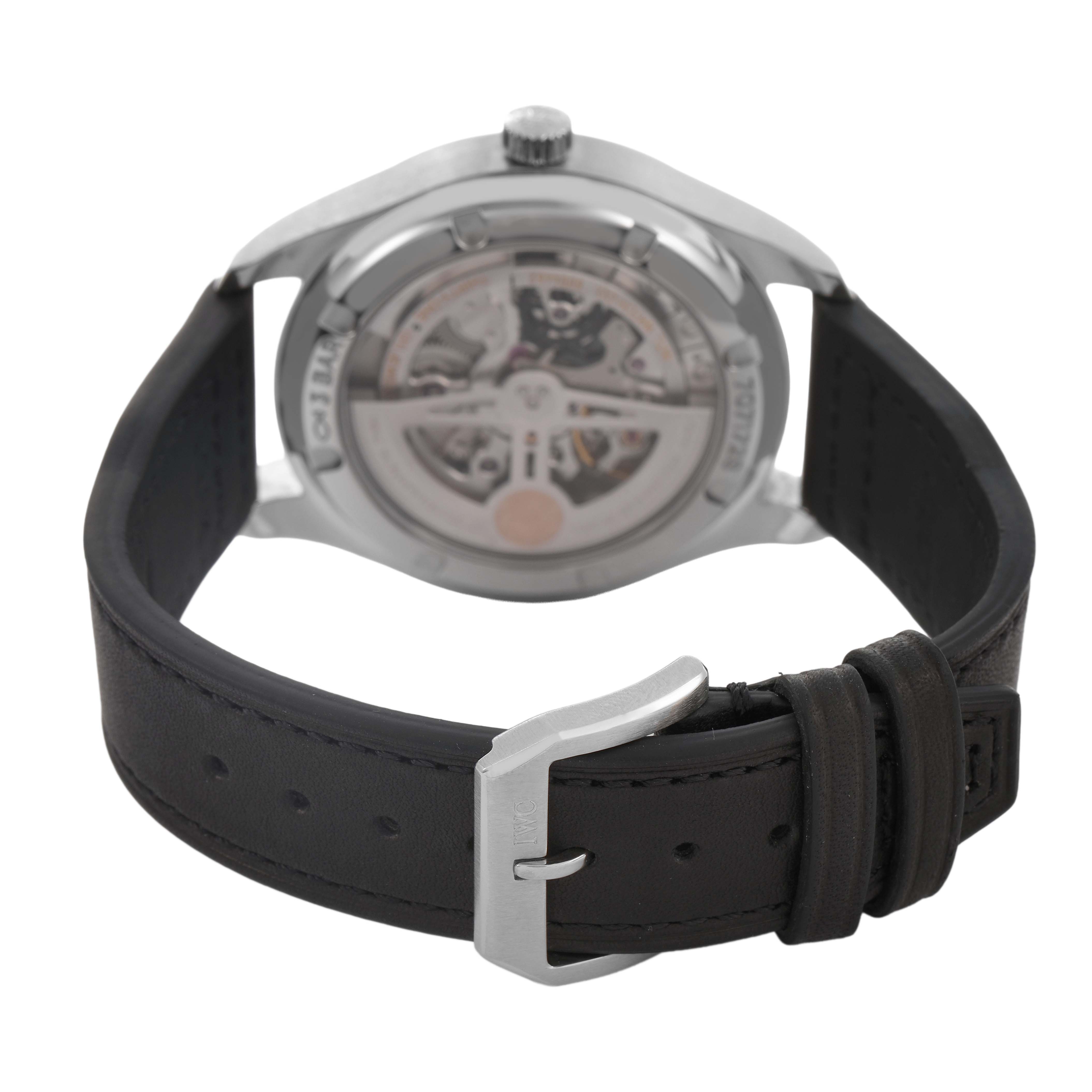 The image shows the back view of an IWC Portuguese IW358304 Men's Stainless Steel Silver Dial watch, highlighting the movement through the transparent caseback and the leather strap.
