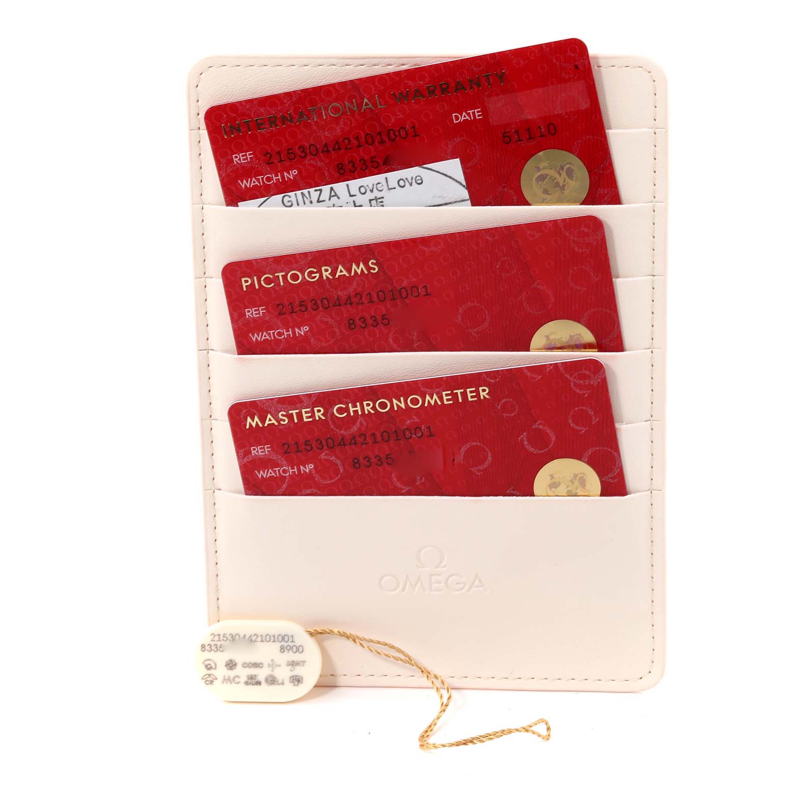 The image shows warranty and certification cards along with a tag for the Omega Planet Ocean 215.30.44.21.01.001 Men
s Stainless Steel Black Dial 215.30.44.21.01.001 Men
s Stainless Steel Black Dial watch.