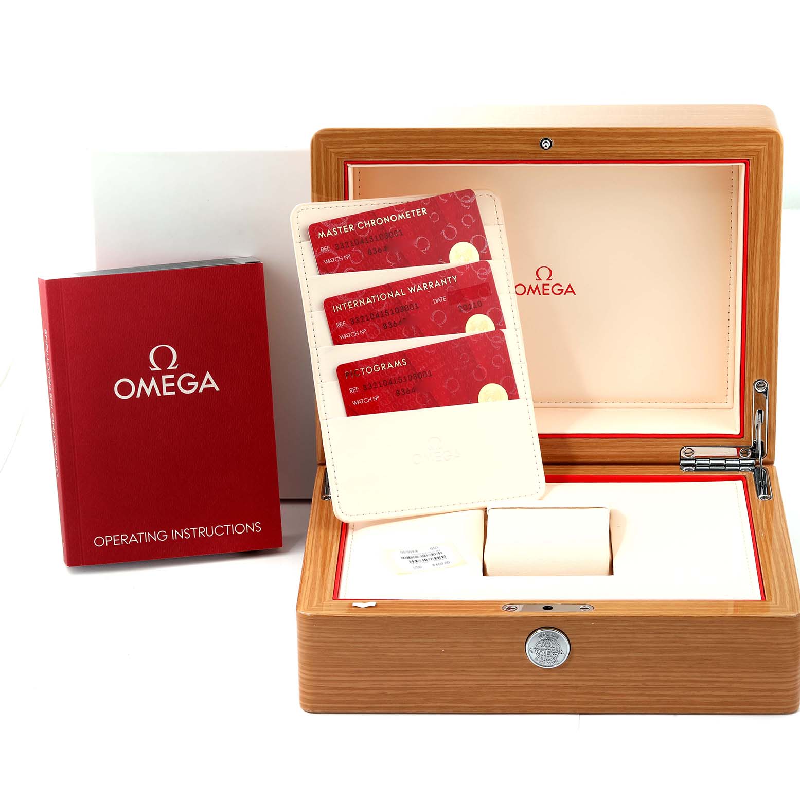 The image displays the packaging, warranty cards, operating instructions, and the presentation box for an Omega Speedmaster 332.10.41.51.03.001 Men
s Stainless Steel Blue Dial 332.10.41.51.03.001 Men
s Stainless Steel Blue Dial watch.