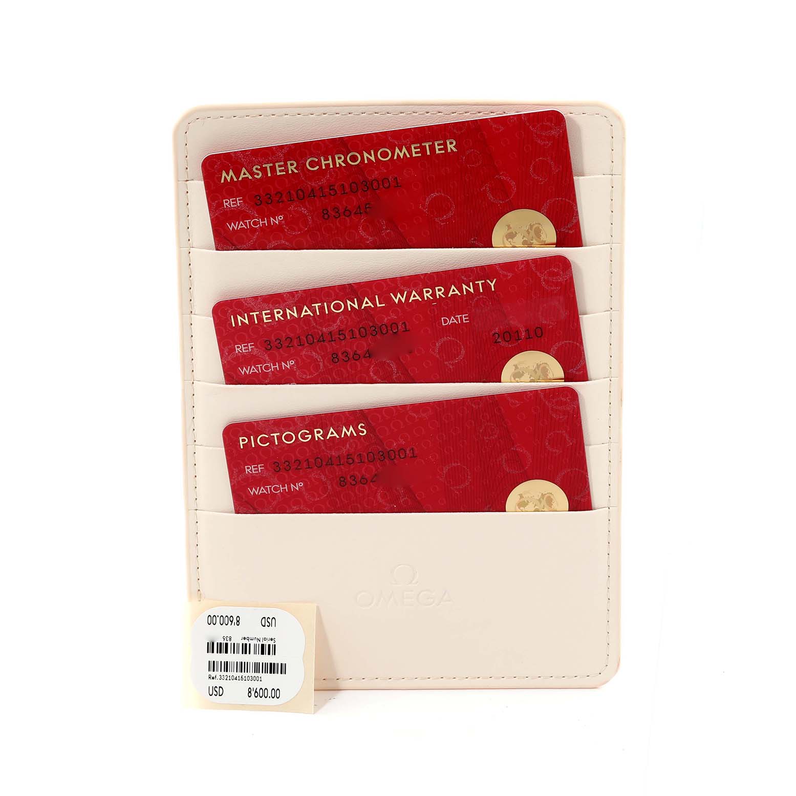 The image shows warranty cards and documentation for the Omega Speedmaster 332.10.41.51.03.001 Men
s Stainless Steel Blue Dial 332.10.41.51.03.001 Men
s Stainless Steel Blue Dial from a top-down angle.