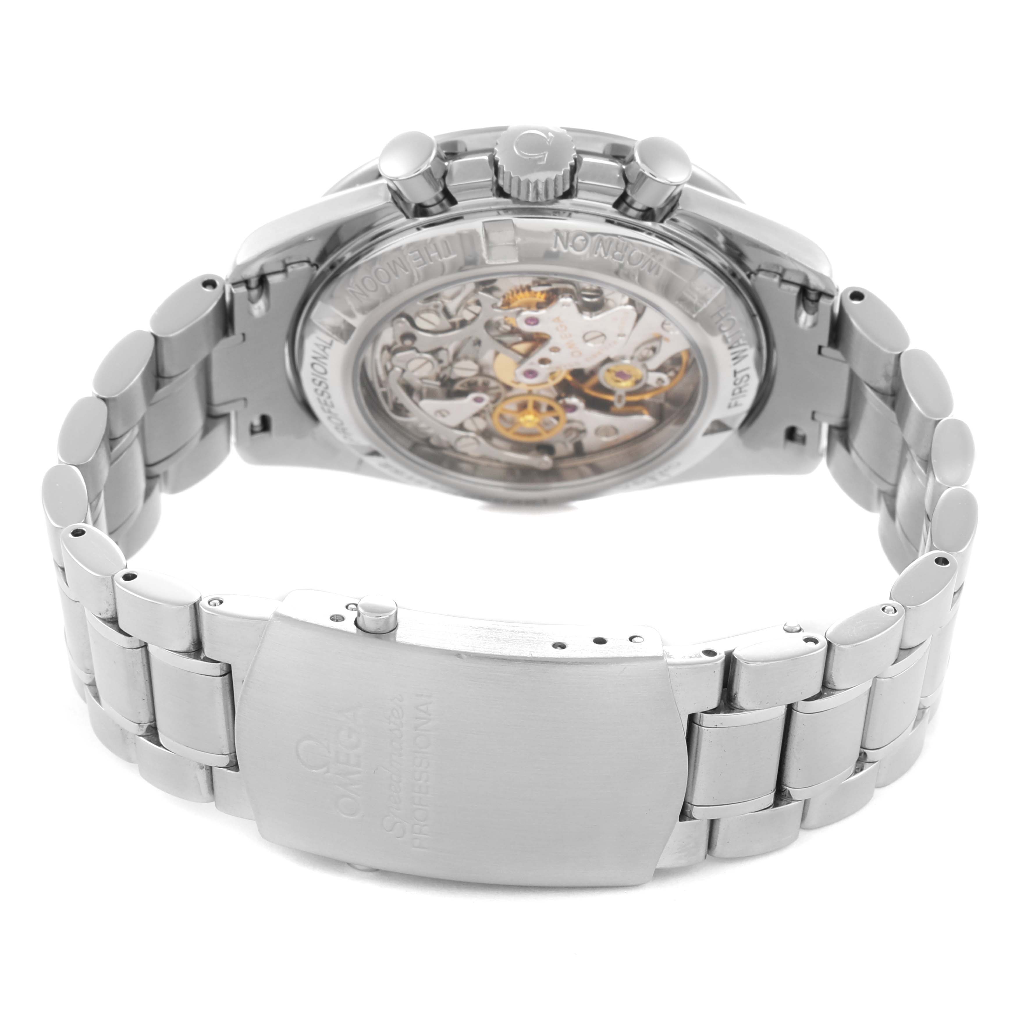 The image shows the back view of the Omega Speedmaster model 311.30.42.30.01.006, highlighting its transparent case back and stainless steel bracelet.