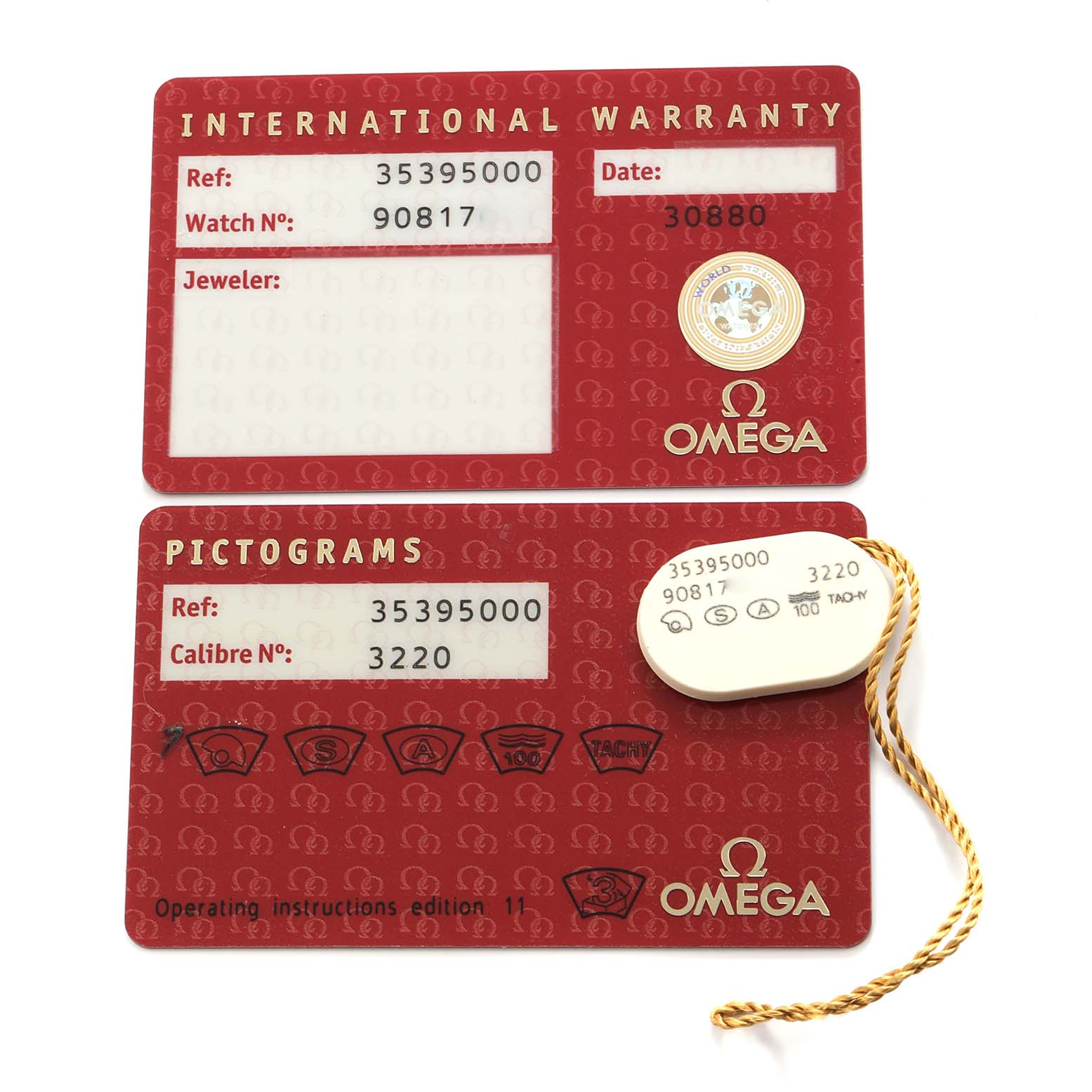 The image shows Omega Speedmaster model 3539.50.00 accessories, including two cards with warranty and pictograms, and a tag with reference and caliber information.