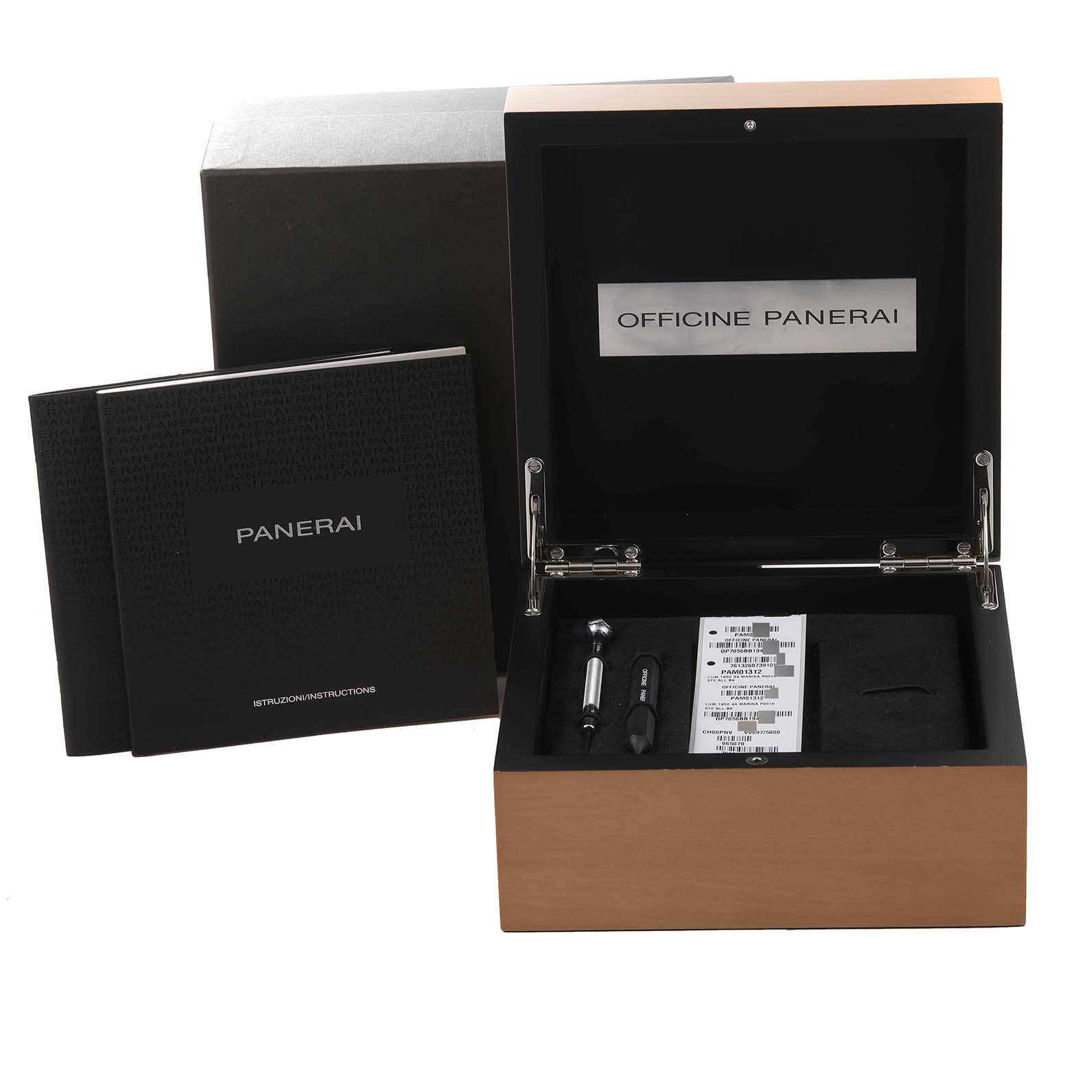 The image shows a Panerai Luminor PAM01312 Men's Stainless Steel Black Dial PAM01312 Men's Stainless Steel Black Dial watch box with manuals and tools from an above-front angle.
