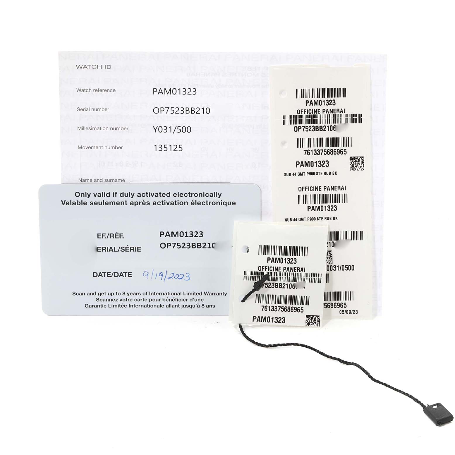 This image shows the warranty card, serial number tags, and certifications for the Panerai Submersible PAM01324 Men's Stainless Steel Grey Dial PAM01324 Men's Stainless Steel Grey Dial model PAM01323.