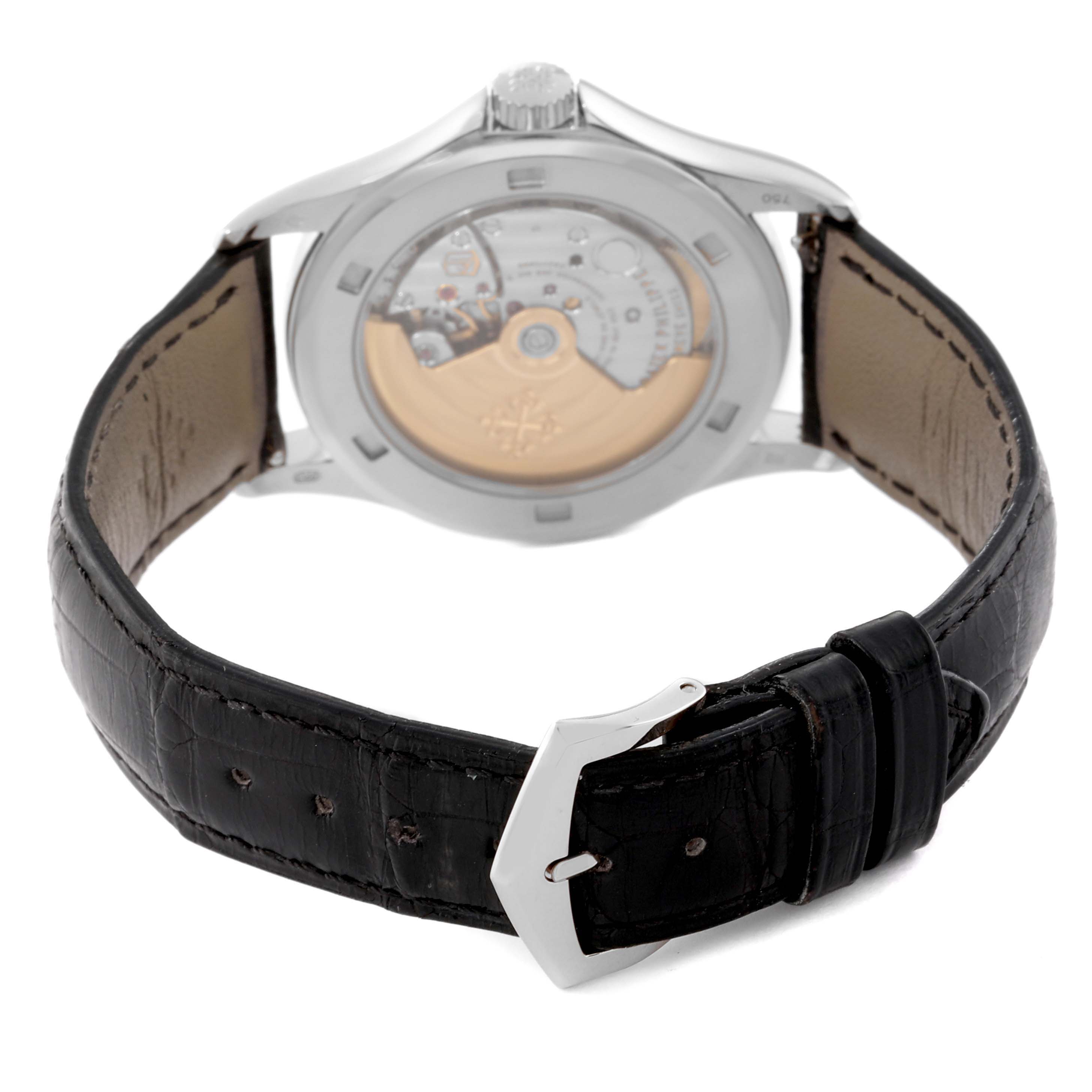 The image shows the backside and strap of the Patek Philippe Calatrava 5127G-001 Men's White Gold Silver Dial 5127G-001 Men's White Gold Silver Dial watch, highlighting its transparent case back and leather band.