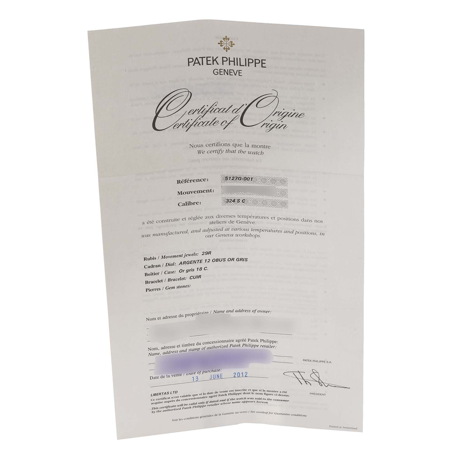 The image shows the Certificate of Origin for a Patek Philippe Calatrava 5127G-001 Men's White Gold Silver Dial 5127G-001 Men's White Gold Silver Dial watch, model reference 51276-001, signed and dated.
