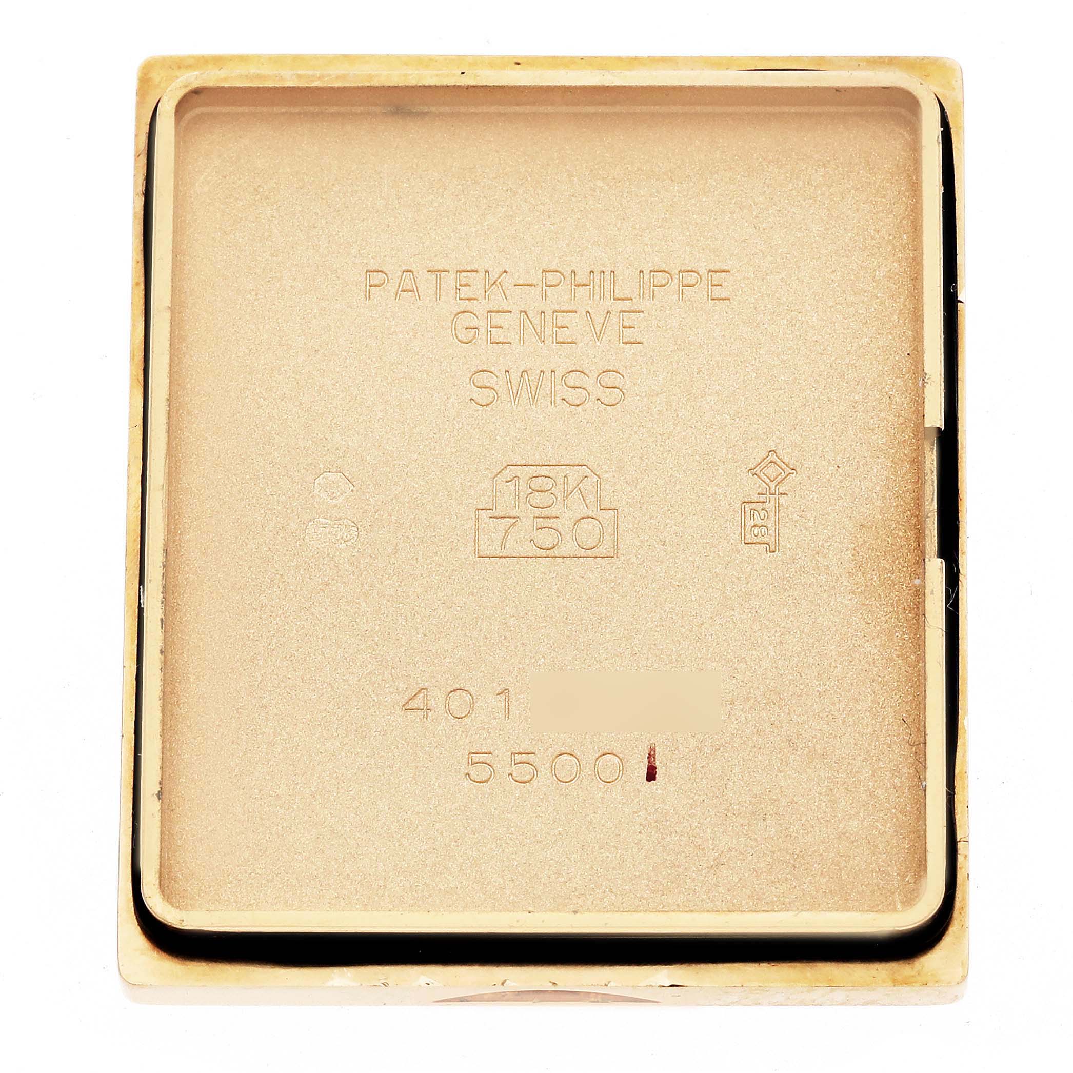 The image shows the inner case back of a Patek Philippe Pagoda 5500J Men's Yellow Gold Champagne Dial 5500J Men's Yellow Gold Champagne Dial watch, with engravings and gold markings visible.