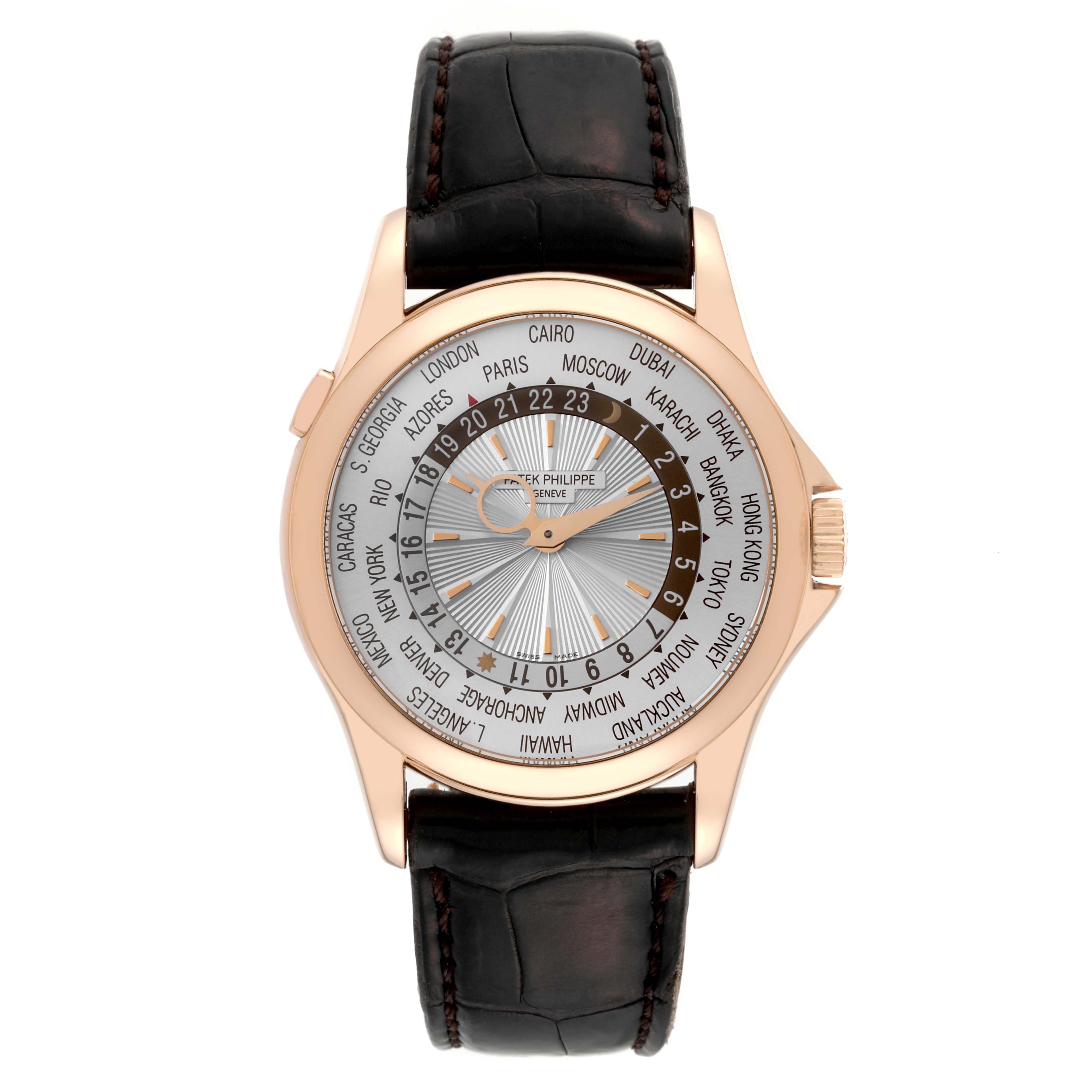 The image shows a front view of a Patek Philippe Complications 5130R-001 Men
s Rose Gold Silver Dial 5130R-001 Men
s Rose Gold Silver Dial model watch with a leather strap and world time display.