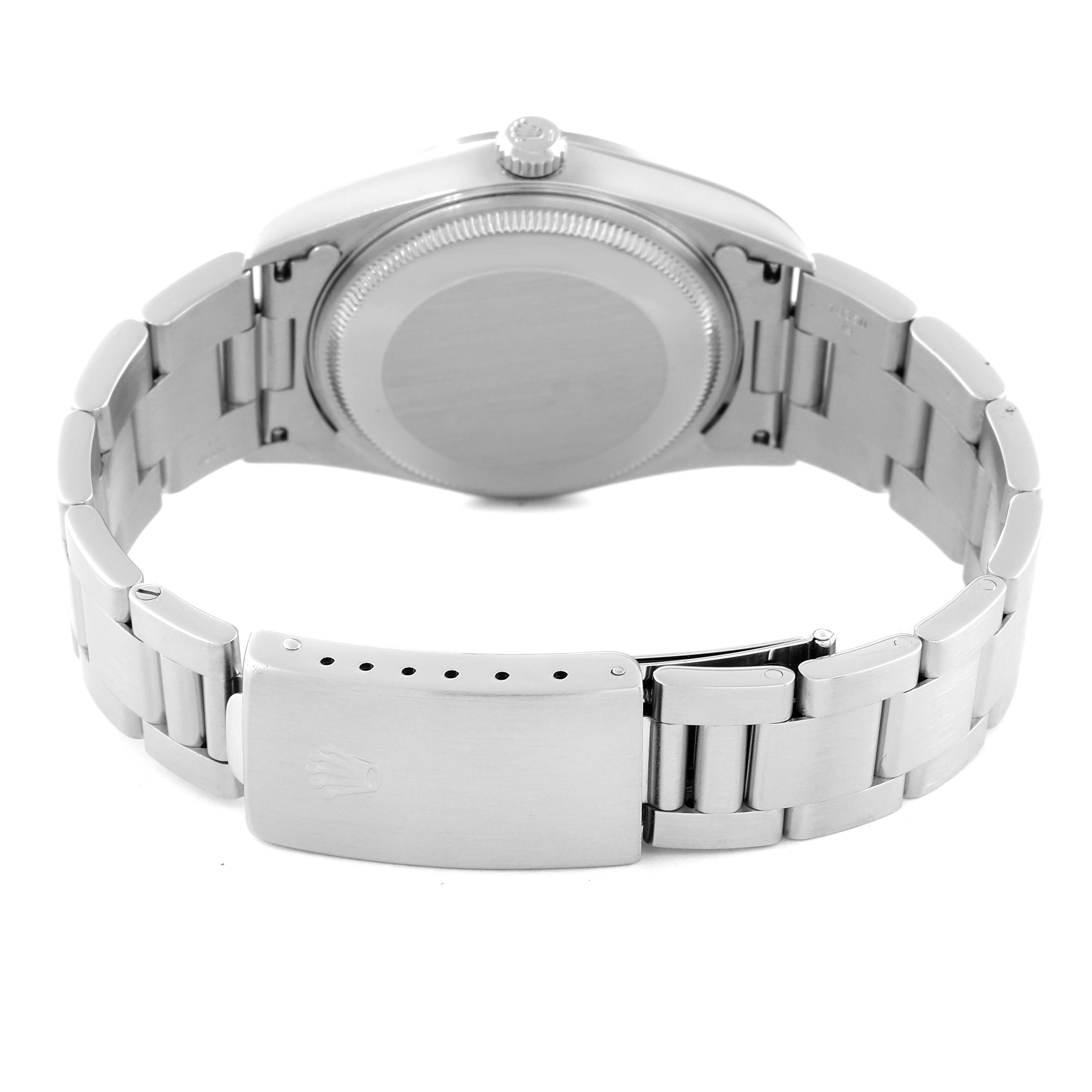 The image shows the rear view of a Rolex Air-King 14000 Men's Stainless Steel Black Dial 14000 Men's Stainless Steel Black Dial watch, highlighting its clasp, bracelet, and case back.